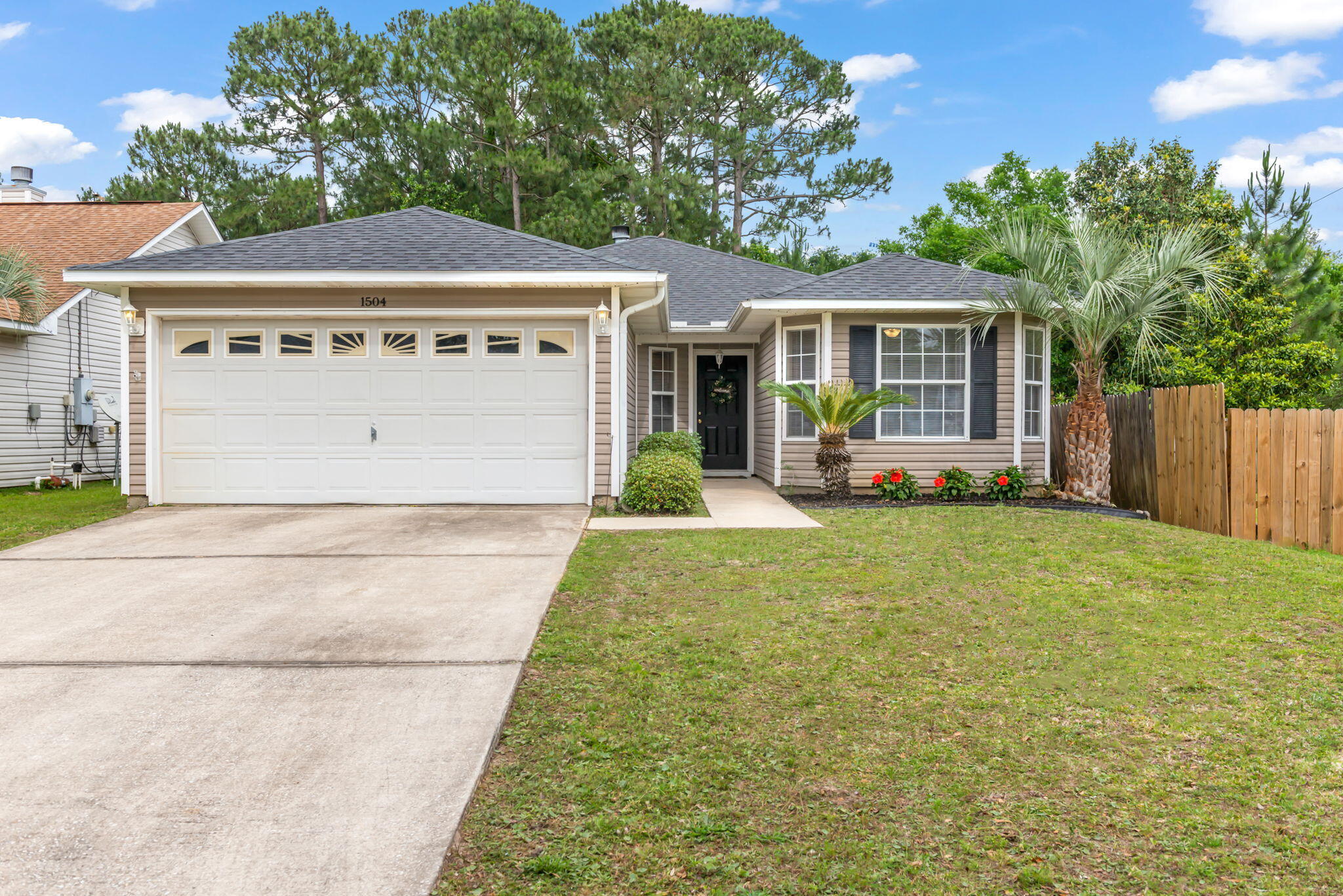 OPEN HOUSE Saturday & Sunday from 1-3. As charming as it is modest, this impeccably maintained and carefree patio home is everything you've been waiting for! You'll feel right at home in this most welcoming yet peaceful neighborhood that is located in the heart of Gulf Breeze. Perfectly priced and move in ready, this home has undergone many recent upgrades to include new roof 2023, new hot water heater 2023, newer HVAC 2022, and new LVP flooring spanning through main living area of home. As you arrive, you will love the inviting curb appeal consisting of attractive black shutters framing the front bay window flanked with tropical landscaping. Entering you will be amazed by the bright living space featuring an open concept layout with attractive LVP flooring, vaulted ceiling, and cute plant