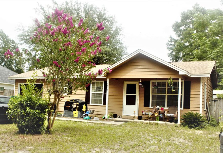 CHARMING AFFORDABLE HOME IN NICEVILLE, FL. This well maintained home features a split semi-open floor plan with plenty of closets and storage space. A 20' X 10' shed. This cozy house was remodeled in 2011, to include, title throughout, except bedrooms, new countertops, new appliances, vanity, garage side door and doggy door. Washer and a gas dryer. 1 Year home warranty plan. Short commute to military bases and our beautiful white sandy beaches.