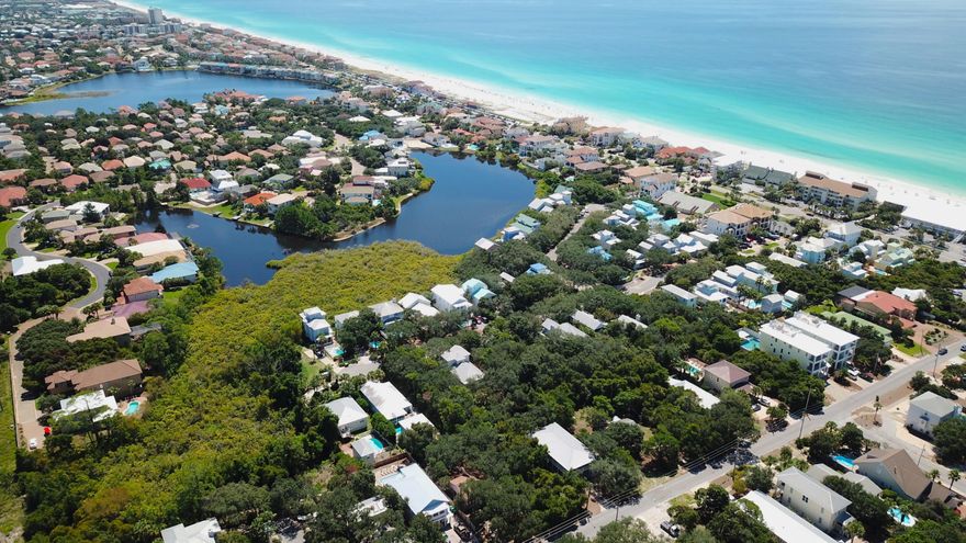 This wooded lot in Destin, measuring 50 feet wide by 150 feet deep is a blank canvas just waiting to accommodate your dream home. Located in Kokomo Kove in Crystal Beach, the lot has no stipulations on build-out time, so you can hold the land as a real estate investment or begin building your new beach house immediately. Enjoying a quiet cul-de-sac position, this 7,500 square foot lot has ample room for a pool or carriage house. Surrounded by Old Florida-style cottages and established beach houses, the neighborhood enjoys deeded beach access across Scenic Gulf Drive.