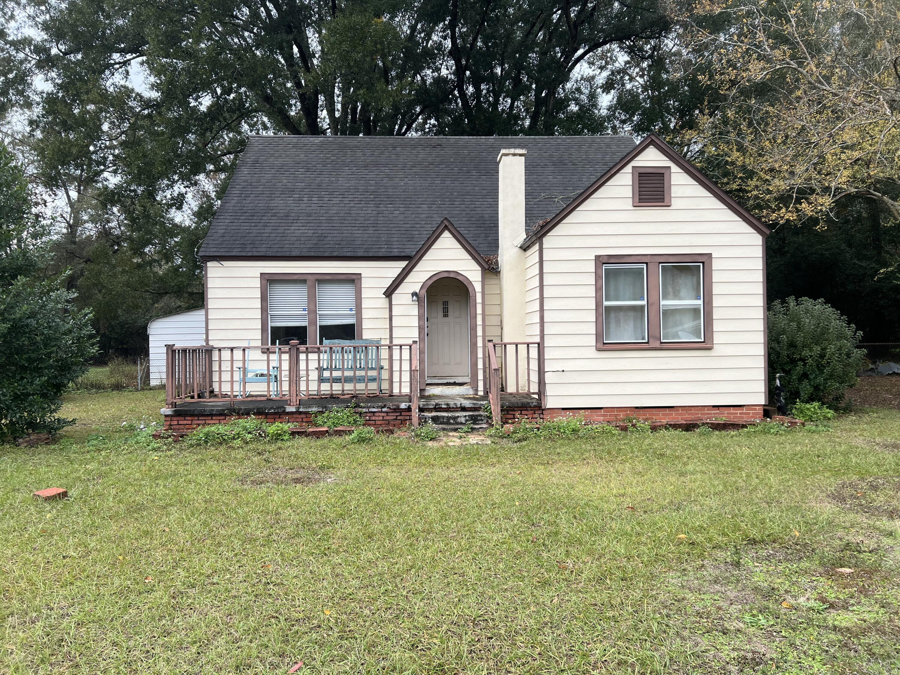 Built in the late 1940's, this centrally located cottage home awaits! Home has 4 bedrooms and 2 baths, with 2 of the bedrooms and 1 bath on the second floor. Home has updated wiring,  new HVAC, and tons of potential. If looking for a long term hold or possible fix and resale, this just may be the one you are looking for. Call today!