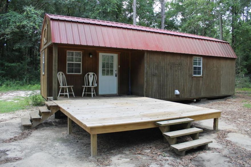 Welcome to Blackwater Forest! This beautiful 12.5 acre property offers a wonderful quiet get away and would make a great hunting camp due to the shared boundary with the Blackwater Forest. This well priced property is located on Eadie Cotton Rd less than 1/2 mile from the popular Peaden Bridge swimming hole! No need to bring a tent or camper. With a great 1 bedroom 1 bath lofted cabin already in place you can camp and hunt on the property as well as enjoy fishing, swimming just a short walk/ride down the road. Along with the cabin, the property also has nice shed for your ATV or boat as well as a chicken coup. Only cash offers.