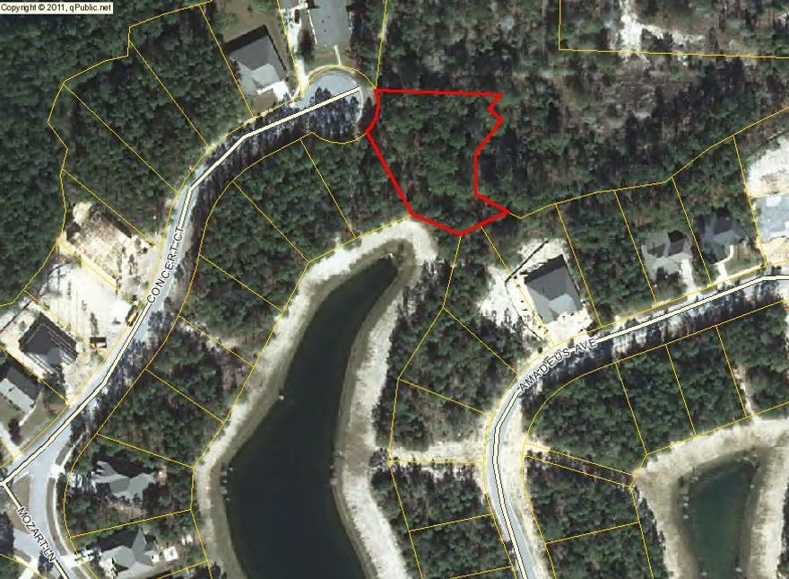 Great opportunity to purchase one of the largest lots in Symphony. Over a half acre located on a quiet cul-de-sac with lake frontage and right next to miles of nature trails. The amenities at Hammock Bay include: 6000 sq ft Clubhouse with movie theatre and full kitchen, 4000sq ft State of the Art Fitness Club, 25 meter lap pool, resort-style pool, putting green, lighted tennis court, $250,000 playground, basketball courts, meeting facility. The Bay Pavilion offers a pier located on 480 ft Choctowahatchee bay. Don't miss this opportunity to build your own custom home in Hammock Bay.