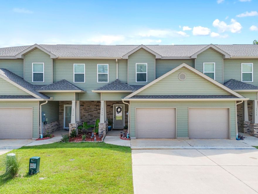 OPEN HOUSE SUNDAY AUG. 18TH!*ONLY 2 years OLD! This like-NEW luxurious Craftsman townhome adheres to the latest building and energy standards.*HVAC warranty included! Situated centrally between Hurlburt and Gulf Breeze, this residence offers three bedrooms, two full bathrooms, and a powder room. **SHORT TERM RENTALS ALLOWED** The home is adorned with luxury vinyl plank flooring, ensuring effortless maintenance. The main level presents an open floor plan, with the kitchen overlooking the dining area and the spacious Great Room. Equipped with granite countertops, the kitchen boasts stainless steel appliances, including a stove, dishwasher, and microwave. Fridge, Washer and Dryer are INCLUDED! On the upper level, the Master bedroom occupies the rear of the home, featuring a private master