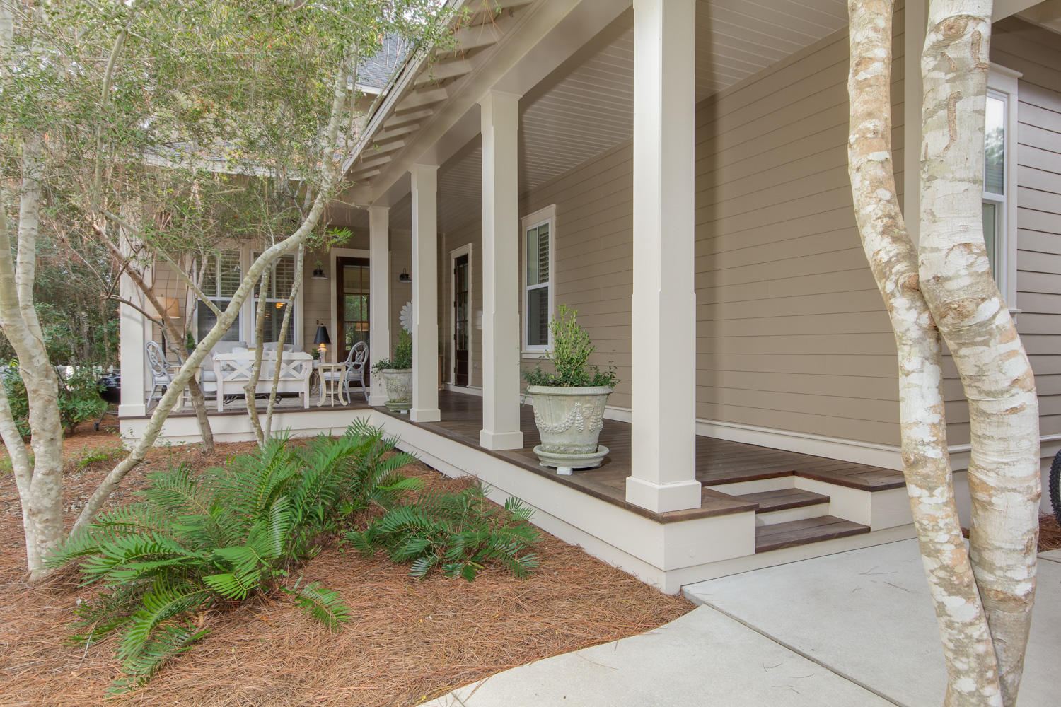 This Gorgeous Huff built Florida Cottage was upgraded as their model. 3 bdrm 3.5 baths with beautiful wide plank reclaimed pine floors contrast with the custom cabinets, stainless steel appliances, gas stove/oven, granite counter tops, and glass tile work in the kitchen. All baths are artfully designed with tile work and designer cabinets. Plantation shutters and roman blinds are throughout the house. First floor master suite has custom double closets, a walk-in shower and a beautiful claw foot bathtub. There is a large screened-in porch for outdoor living overlooking the neighborhood park and a second porch facing the nature preserve. Set back on a quiet street, this home offers you privacy. Detached 2 car garage with custom wood storage shelves and outdoor shower. Sold unfurnished.
