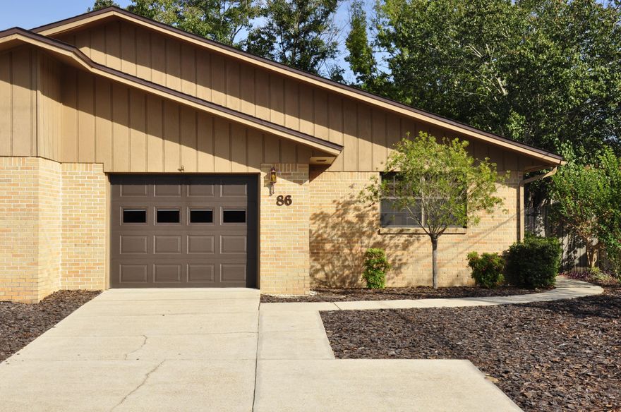 Lovingly maintained townhome in a prime location! Townhome comes with two bedrooms, two full bathrooms, and a 1-car garage. A NEW ROOF was installed in 2016, so you can have peace of mind! Thanks to the landscaping in both the front yard and backyard, you will have minimal lawn maintience. The exterior of the home features brick siding paired with wood siding of a similar color. Once you enter the home, you are greeted with a cozy entryway that offers a warm welcome to guests. The entryway opens up to the great room and dining area. Kitchen is situated just off the dining area. The breakfast bar allows you to cook and entertain with ease. Store all of your kitchen essentials in the pantry as well.