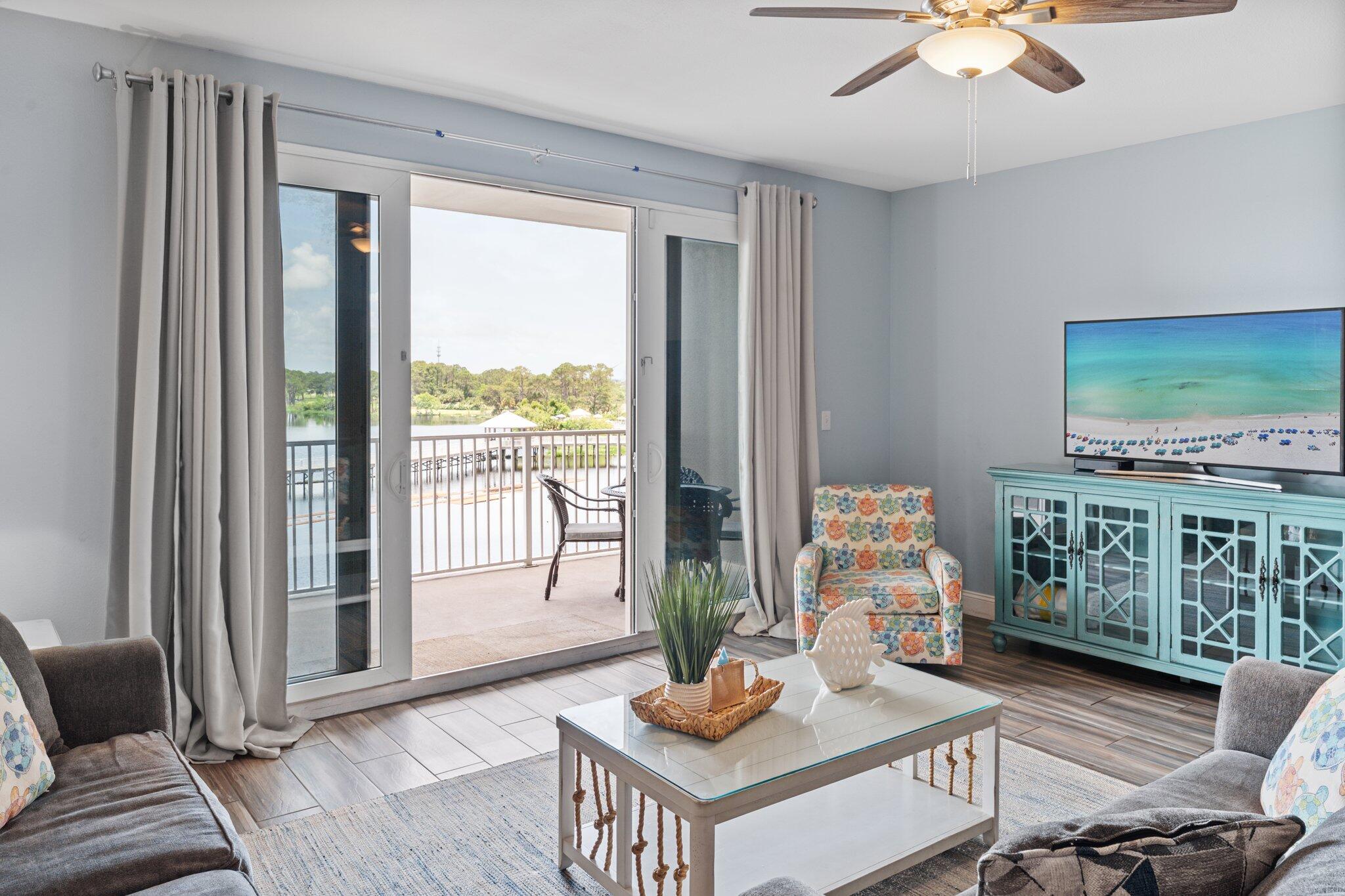 No elevator needed to get to this condo, just park on the 3rd floor and walk over! This perfect turnkey, rental-ready lakeview condo at Laketown Wharf offers 1 bedroom, 2 bathrooms, plus a bunk room with approximately 1,047 sqft. Enjoy a spacious open living and dining area featuring granite countertops and a fully equipped kitchen with a breakfast bar. Matching wood-look porcelain tile throughout. Recent upgrades include newer sleeper sofa and loveseat (2023), newer HVAC system (2022), and newer water heater (2022). Step out onto the spacious balcony to take in stunning lake views and fountain displays. Laketown Wharf offers exceptional resort amenities with 5 swimming pools, a putting green, and so much more!