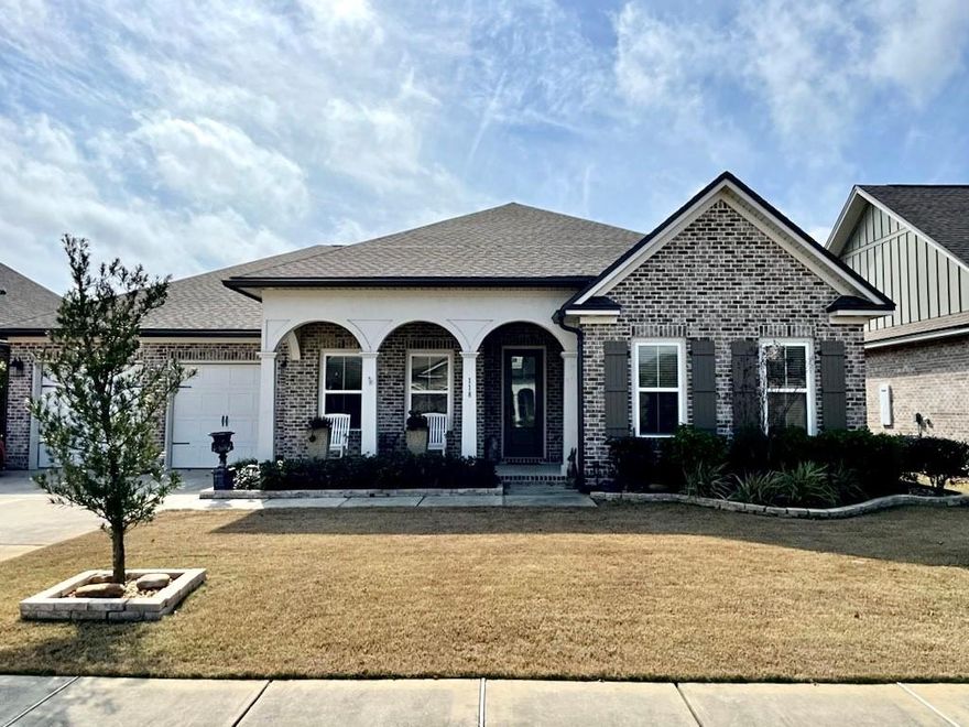 Almost new all brick 4BR/3BA home situated on premium waterfront homesite. Home has a beautiful backyard setting! This is a quality home built by Randy Wise with open floor plan featuring 9' ceilings, granite counter tops, crown moulding, cased windows & openings. Awesome kitchen with Wood Harbor cabinets with 100 yr finish warranty, 2 islands, barely used gas range, oversized built-in stainless refrigerator and pantry. There are 2 porches: side porch is 14 x 14 and the back porch is 14 x 30 with additional 9 x 14 concrete pad. The back yard is fenced. The extended 2-car garage has a heated & cooled hobby room that is 135 square feet (not included in living sq footage) Rinnai water heater and sellers installed new generator this past year. This home has many upgrades & is truly a cut above