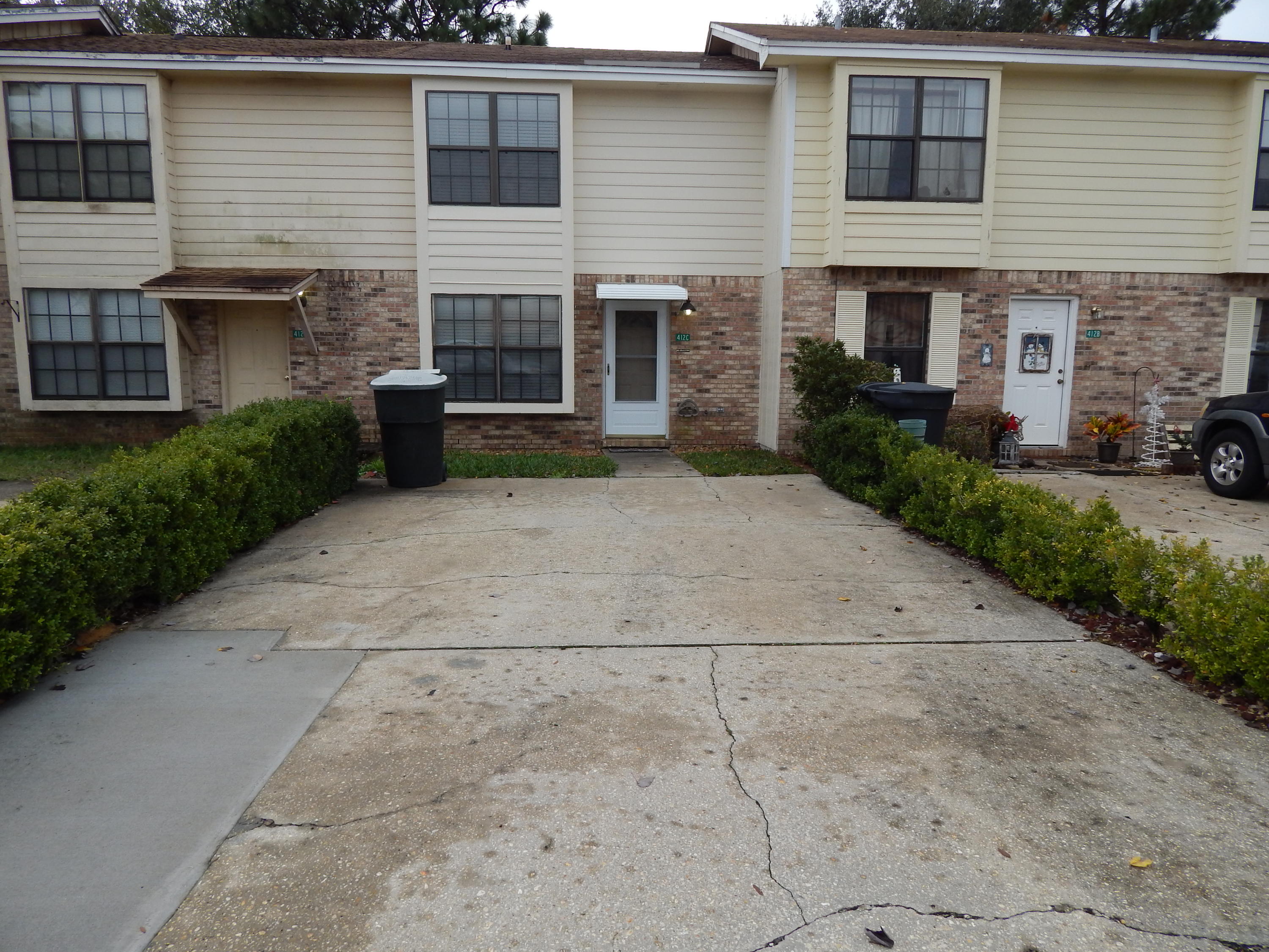 This clean and move-in ready townhouse has been well maintained by the Owner. Fresh paint and new carpet throughout!No home owners association fees on this low maintenance Brick and Wood townhome. Large Laundry room is inside and also serves as Pantry Space. Small, Privacy Fenced backyard. Newer Roof and HVAC - Approx 2011. Large Living Room, Dining, Kitchen, and Half Bath downstairs. 2 Bedrooms adn Full Bath Upstairs. One Bedroom has a large Walk-in Closet! There are FOUR Dedicated Parking Spaces! Centrally located, this 2 story unit is close to Santa Rosa Mall, Grocery stores, Fort Walton High School and Edwins Elementary School.