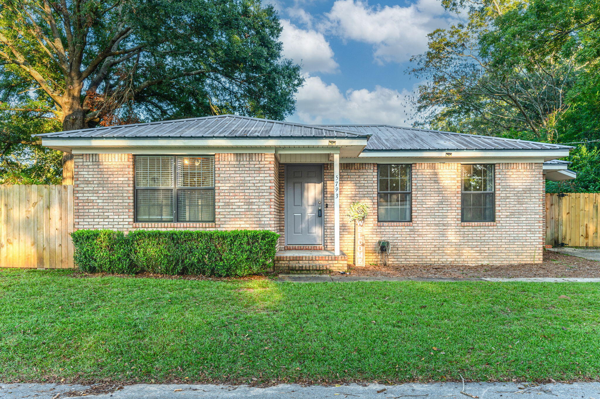 Don't miss out on this charming home! Enjoy a fully fenced backyard on a spacious corner lot. NEW FLOORING! The home has been updated with new paint and refinished kitchen cabinets. New HVAC system and water heater. Great location with just a short drive to local shopping and the beaches.