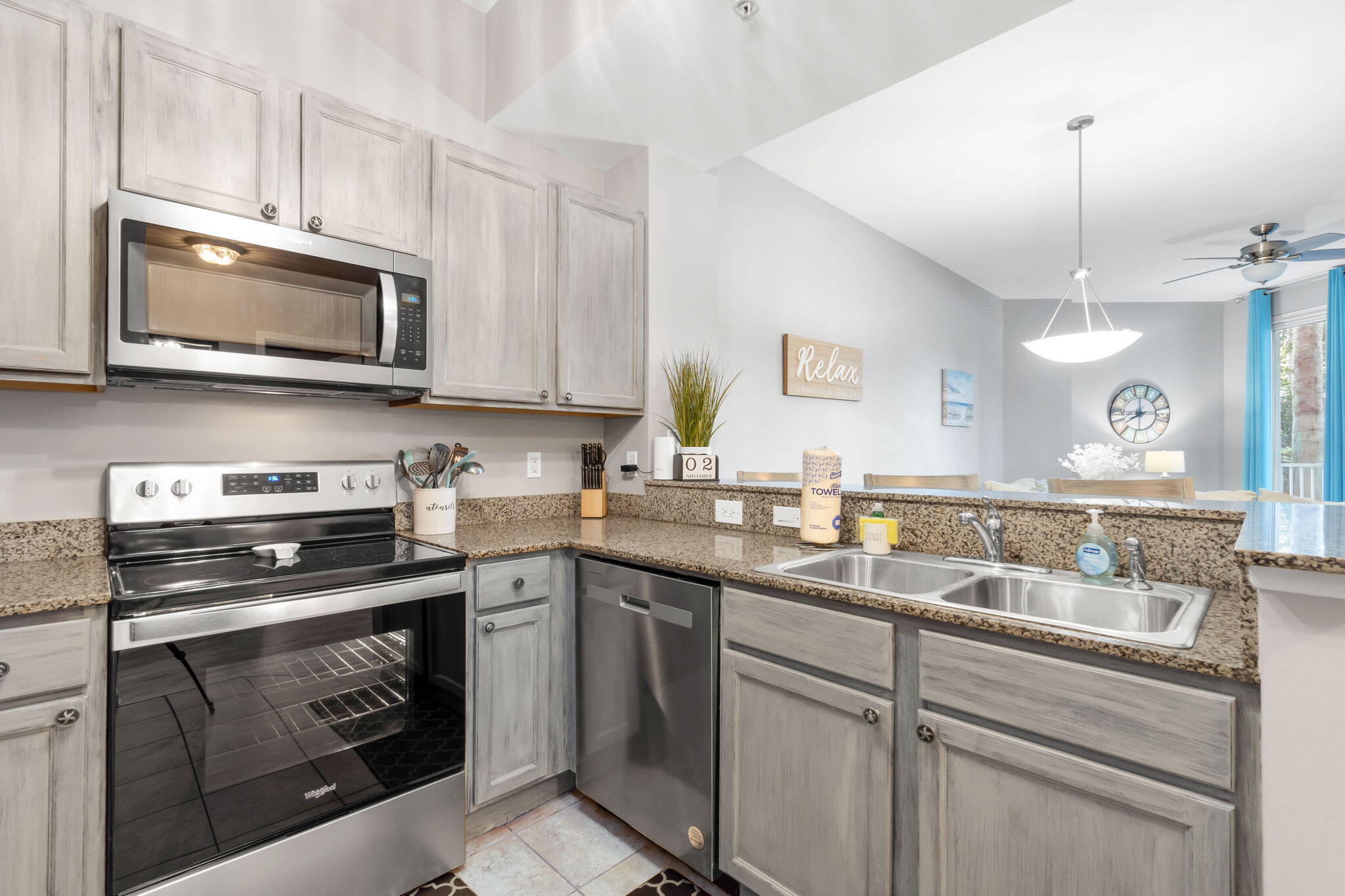 Seize this remarkable chance to own a slice of paradise at The Palms! This unit has a solid rental history, having been successfully self-managed on Airbnb and VRBO. It generated $57,000 in 2023, $51,000 in 2024, and has already earned nearly $11,000 this year for 2025, with an additional $18,000 in future bookings and over $3,000 secured for 2026!The kitchen features stainless steel appliances, granite countertops, and painted cabinets, all within an open-concept living area. One of the advantages of ground-floor units is the impressive 10-foot ceilings! Step outside to a private patio, surrounded by the lush landscaping of The Palms, offering direct views of the stunning 11,000-square-foot lagoon pool, complete with waterfalls, bridges, and palm trees.The unit includes a primary bedroom with a king sized bed and a second bedroom with bunk beds, along with two full bathrooms. The master bathroom boasts a deep tub and shower combo, while the second bathroom features a fully tiled walk-in showerBoth the master bedroom and living room provide access to the patio. Additionally, the unit comes equipped with a stainless steel, stackable washer and dryer!
**Resort Amenities Include:**
- 11,000 sq. ft. lagoon pool, year-round heated pool, children's splash pad, and kiddie pool
- Tennis courts, pickleball courts, half-court basketball, and playground
- Onsite restaurant, coffee shop, charcoal grills, and picnic areas
- 24-hour fitness center, covered parking garage, electric car charging stations, owner parking, owner dog park, mailboxes, and security. Electric vehicle charging stations also available.
- Free seasonal beach shuttle to June White Decker Park, HarborWalk Village, and Destin Commons
This condo is located just a short stroll from the beach, with a 4-mile walk to June White Decker Park. It offers the perfect blend of relaxation and convenience. All utilities, including electricity, are included in the COA dues, providing a hassle-free living experience.