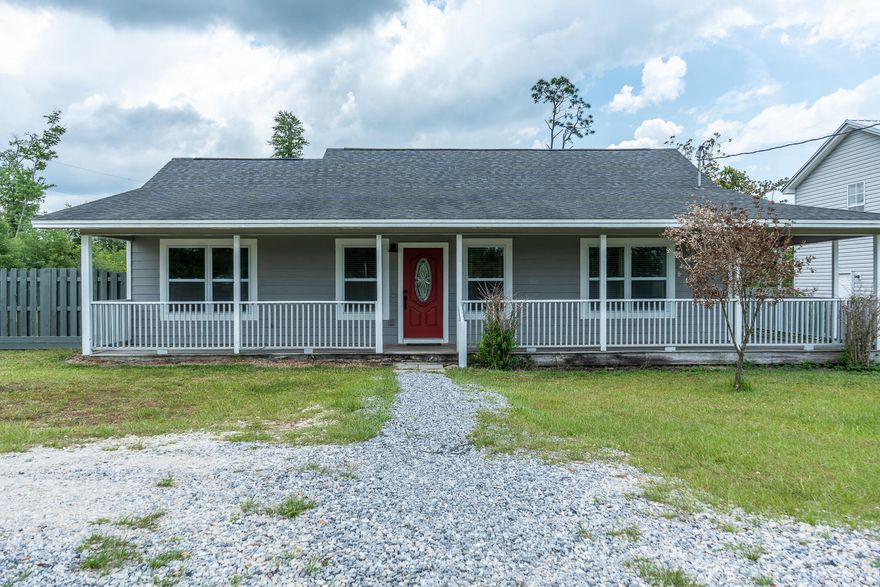 Country living in the city with income potential! The beautiful property features an upgraded 1778SF three bedroom main cottage, oversized double sided detached garage, and a 720SF two bedroom apt/office that is located above the garage and a RV pad! Enjoy your morning coffee or admiring the sunsets on the stunning wrap around porch on this spacious 1.116 acres. As you walk in the home, you will be taken back by the open floor plan that boasts vaulted ceilings,stunning barn doors and a large kitchen that is like new! The home has a split floor plan with a master bedroom ensuite with a gorgeous tiled walk in shower, a walk in closet and double vanities! The detached garage apt is rented out for $1,300/m and can help offset mortgage costs! lease expires 1/31/24! This is a must see property