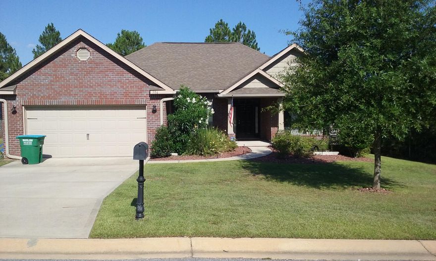 This is a beautiful Rolling Ridge home in an absolutely family friendly neighborhood!  Protected land behind and beside the home also sits on a quiet dead end street which adds to the peaceful setting in this south Crestview home.  The hardwood floor entry welcomes you into a perfect entertaining area.  Arched doorways and large windows in the formal dining, cathedral ceilings in the living room as well as a trey ceiling in master bedroom add to the beauty of the home.  Neutral carpeting & paint, split bedrooms make this home move in ready.  The large kitchen can easily accommodate two cooks and features a bar area, a double door refrigerator w bottom freezer, large cabinets and a spacious pantry.  The Master bedroom is large enough for a king-size bed and still has room for a sitting area