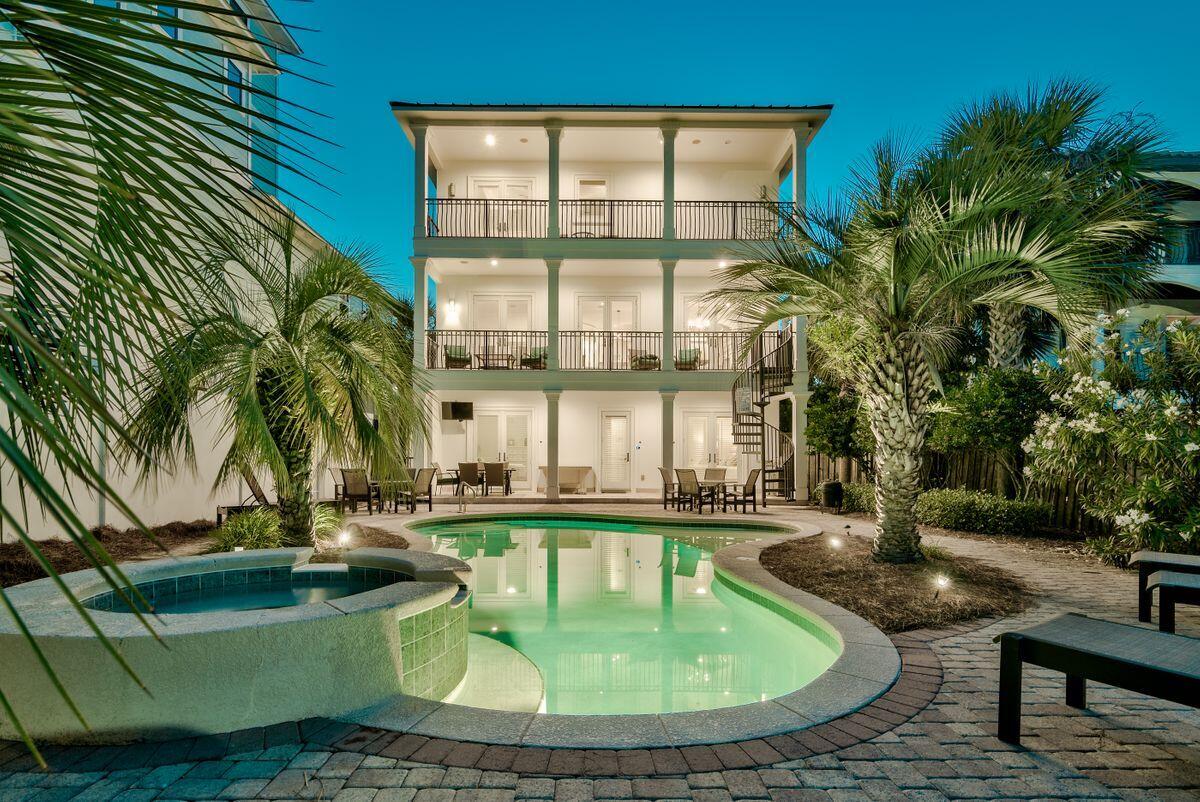 Experience this stunning resort-style rental machine ideally located near exclusive gated beach access within the heart of Frangista Beach. 52 Miami Street is 3,816 sq ft, complete with seven bedrooms, four full baths and one half bath. This property is a rental magnate with over $250,000+ in projected annual income and a solid rental history. Notable features include a private elevator accessible to all floors, two car garage, large lagoon style pool with tiki bar and adjoining summer kitchen, multiple master suites, gulf views from the second and third floors as well as ample living space perfectly functioned for entertaining. The layout is extremely open with living spaces outlined on each level of this three story home.