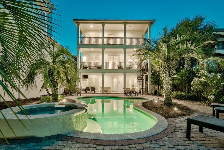Experience this stunning resort-style rental machine ideally located near exclusive gated beach access within the heart of Frangista Beach. 52 Miami Street is 3,816 sq ft, complete with seven bedrooms, four full baths and one half bath. This property is a rental magnate with over $250,000+ in projected annual income and a solid rental history. Notable features include a private elevator accessible to all floors, two car garage, large lagoon style pool with tiki bar and adjoining summer kitchen, multiple master suites, gulf views from the second and third floors as well as ample living space perfectly functioned for entertaining. The layout is extremely open with living spaces outlined on each level of this three story home.