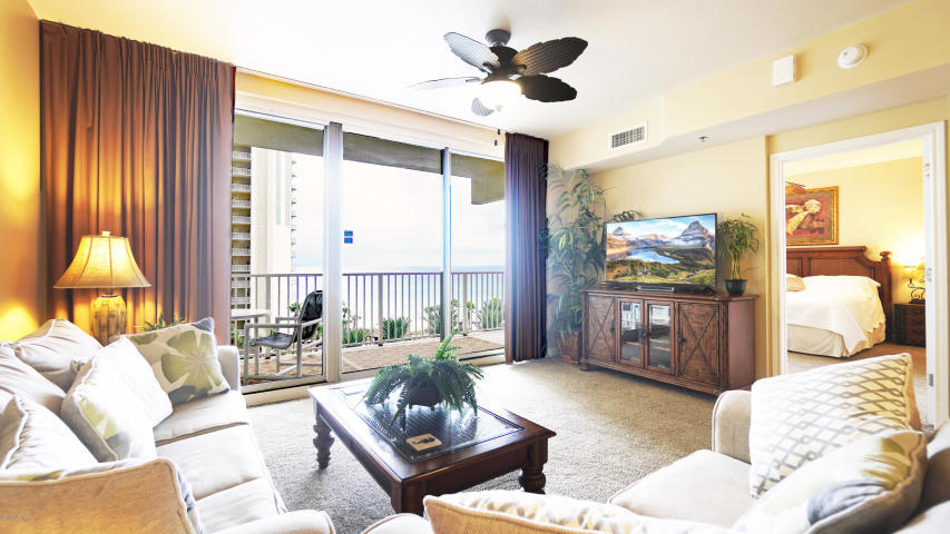 Hard surface flooring has been ordered and will be installed 12/19. The beach getaway you've been dreaming of at the popular resort destination - Shores of Panama! This beach inspired 1 bedroom + bunkroom, 2 bath Gulf front condo conveys fully furnished, rental ready, and conveys with it's own deeded parking space! Perfect 6th floor elevation! Enjoy incredible views of the Emerald Coast over the most expansive pool in Panama City Beach from the coveted '16 stack location. This spacious 907sq.ft., ''Type C'' unit has an extremely efficient floorplan with the kitchen open to living area and master bedroom on the Gulf. Sleeps 6 including bunk room. Sunshine and warm gulf breezes abound from the unit's large, wide balcony.