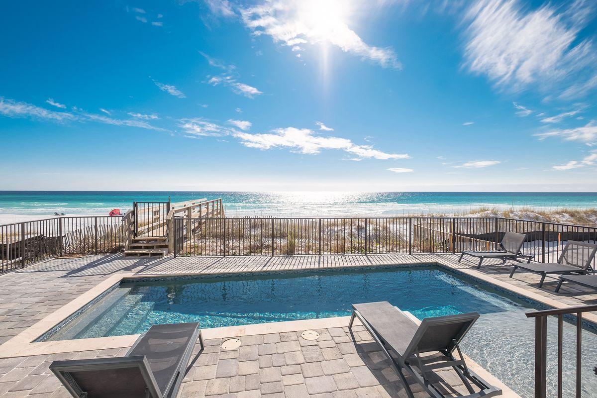 Take in panoramic views of the gulf from all three floors of this newly-built Miramar Beach home, which grossed $481,137 in rental income in 2019. Constructed in 2018, this retreat features 7 king-sized master suites spread across its 3 stories, a gulf-front pool with sitting spa and, an in-home movie theater with recliners. Private beach access makes getting to the sand and emerald green waters of the gulf quick and easy. Inside the home, you'll find sleeping accommodations including bunk rooms with full-sized beds on all floors. The first floor boasts a game room with pool table, television and wet bar that overlooks the pool deck as well as laundry facilities. Take the stairs or elevator to the 2nd floor, where seamless entertaining was built into the design with an open floor plan.