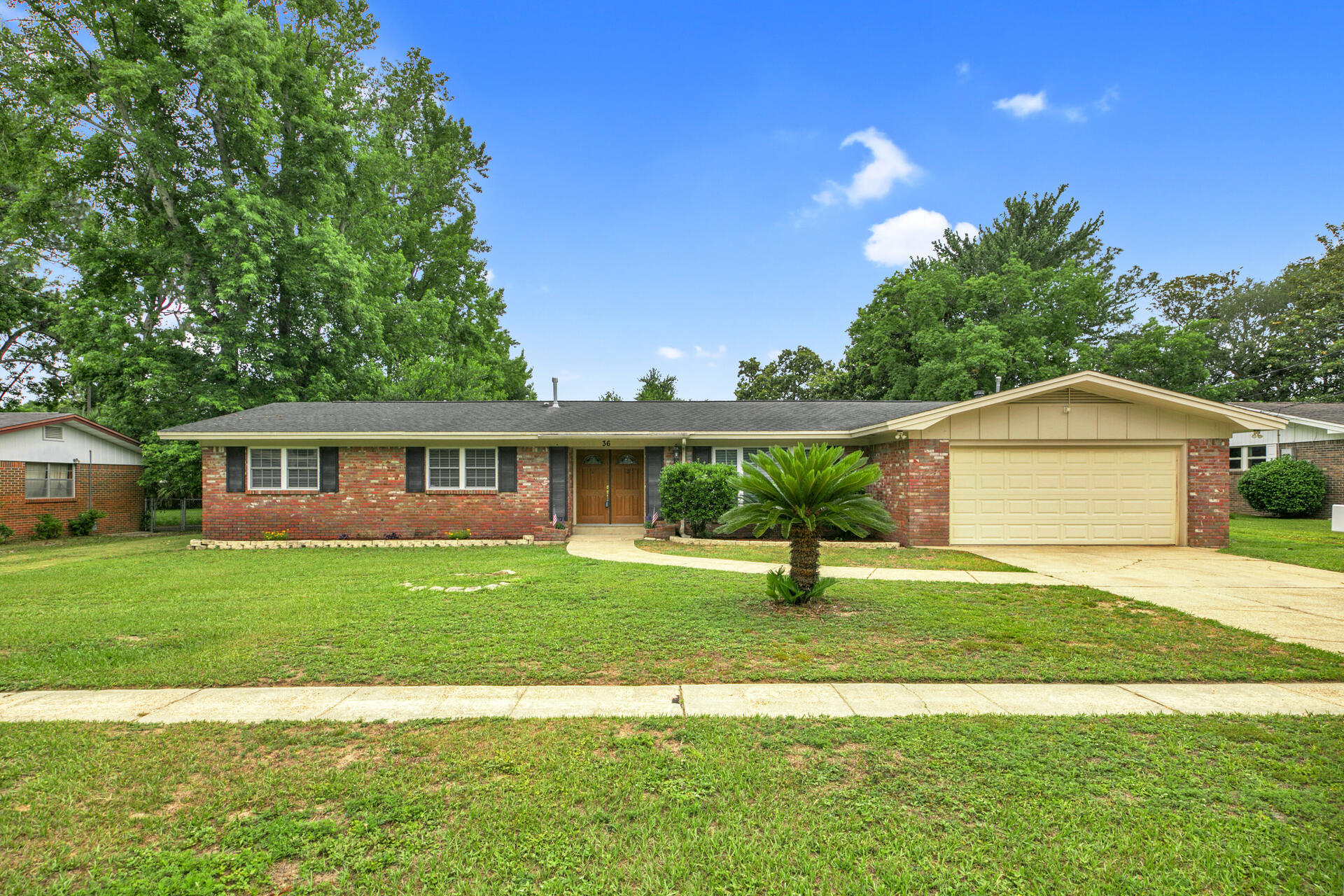 Poquito Bayou Pool Home! This 2,550 sqft one-story ranch boasts 2 living rooms, formal dining, spacious kitchen with breakfast bar and two primary bedrooms with en suites. The kitchen has been nicely updated to include resurfaced cabinets, granite countertops, new sink, faucet, stove and hood. Rear primary bedroom has ADA-compliant doorway and zero-entry shower. Enjoy summer in the shade of your covered patio or cooling off in the screen-enclosed gunite pool. Plenty of room left in the yard! Right down the road from Leo Norred Park and a 2-minute drive to the Poquito Boat ramp. Newer HVAC's, new water heater, new pool pump and lawn pump. Updated wiring. Termite bond in place. Buyer to verify all information deemed important