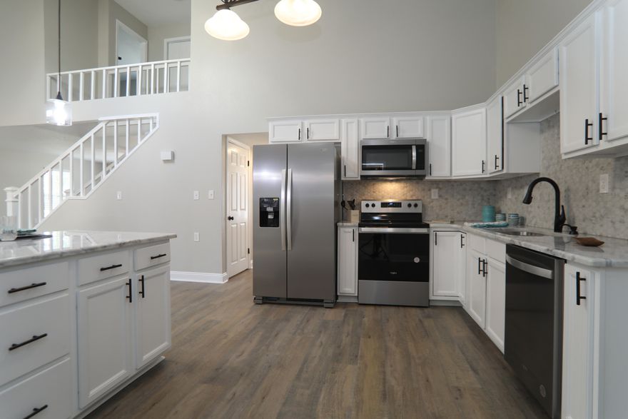 100% REMODELED. NEW ROOF 2023!! 2017 HVAC. Rare find in Holley by the Sea! This house is a 4 bedroom, 3 FULL bathrooms. Updated Kitchen with new appliances, New Granite counter-tops and backsplash. New lights/fans throughout home, New Laminate flooring in main areas, Luxury Vinyl in Baths and Carpet Stairs/bedrooms. Living Room opens to an Open Deck. Master Bedroom downstairs and opens to private Covered Patio. Bathrooms updated with new lights, mirrors, etc. Enjoy to large private backyard completely fenced. Room Sizes approx. buyer to confirm. Buyer to confirm all HOA dues/buyer fees.