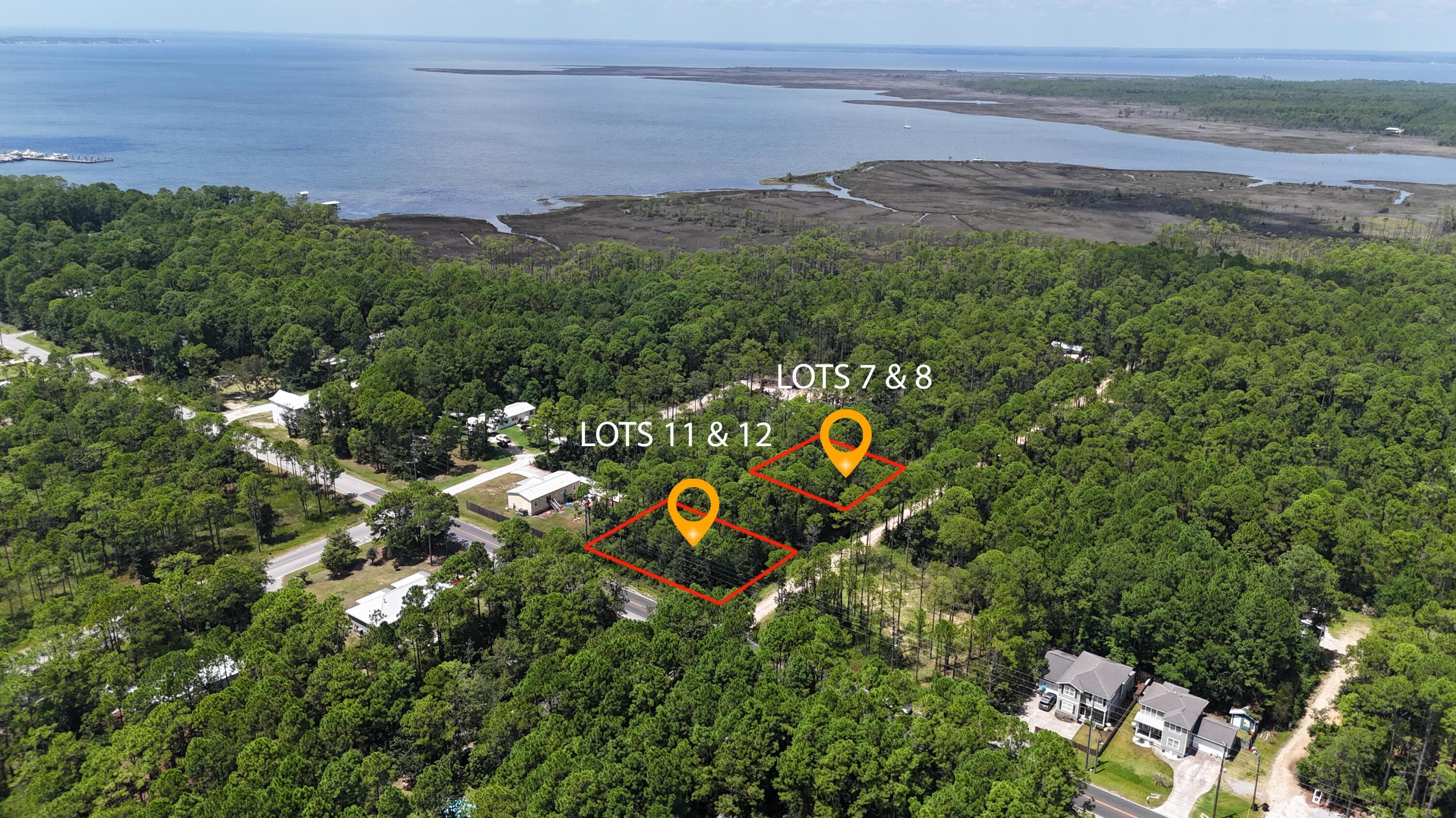 Discover your slice of paradise with this spacious double lot located off Churchill Bayou Rd in the heart of Santa Rosa Beach. Perfectly positioned near a vibrant selection of new restaurants and stores, this property offers the ideal blend of tranquility and convenience. Imagine building your dream home or vacation retreat on this expansive lot, just moments away from the stunning coastline and pristine beaches. Enjoy easy access to the public boat launch located just a couple of miles away, making it effortless to explore the beautiful waters of the Gulf of Mexico and nearby bayous.Surrounded by lush natural beauty, this double corner homesite provides ample space for your vision, whether it's an expansive family abode or a cozy getaway. Don't miss this incredible opportunity to invest in one of Florida's most sought-after beach communities. Embrace the lifestyle of Santa Rosa Beach, where outdoor adventures, exquisite dining, and boutique shopping await you!

Property does not have water or sewer yet. Road is not paved yet. Water and sewer available at Churchill Bayou Rd .
