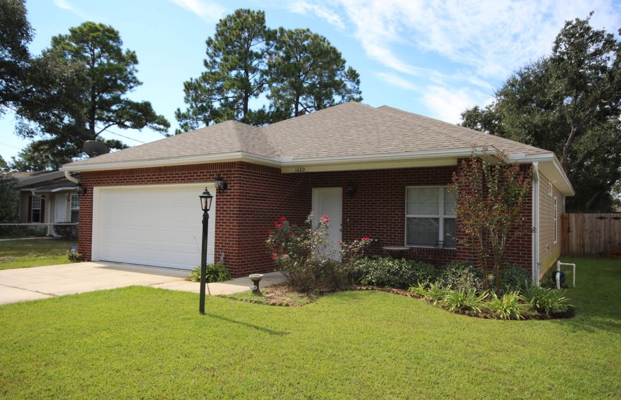 Peak of perfection! This centrally located home is easy on the eyes, easy on the pocketbook. Why rent when you can buy for much less. This 3 bedroom and 2 bath home offers the lifestyle you can afford highlighted with cathedral ceilings in great room makes this home light and bright. Great room is adjacent to eat-in kitchen. The kitchen features a breakfast bar that can accommodate any meal or gathering highlighted with granite countertops, maple cabinets, Stainless steel microwave, refrigerator, dishwasher, tile floors and Garbage disposal. Enjoy your morning cappuccino on your covered front porch or the privacy of your covered back porch. Extend your entertainment to your privacy fenced back yard.