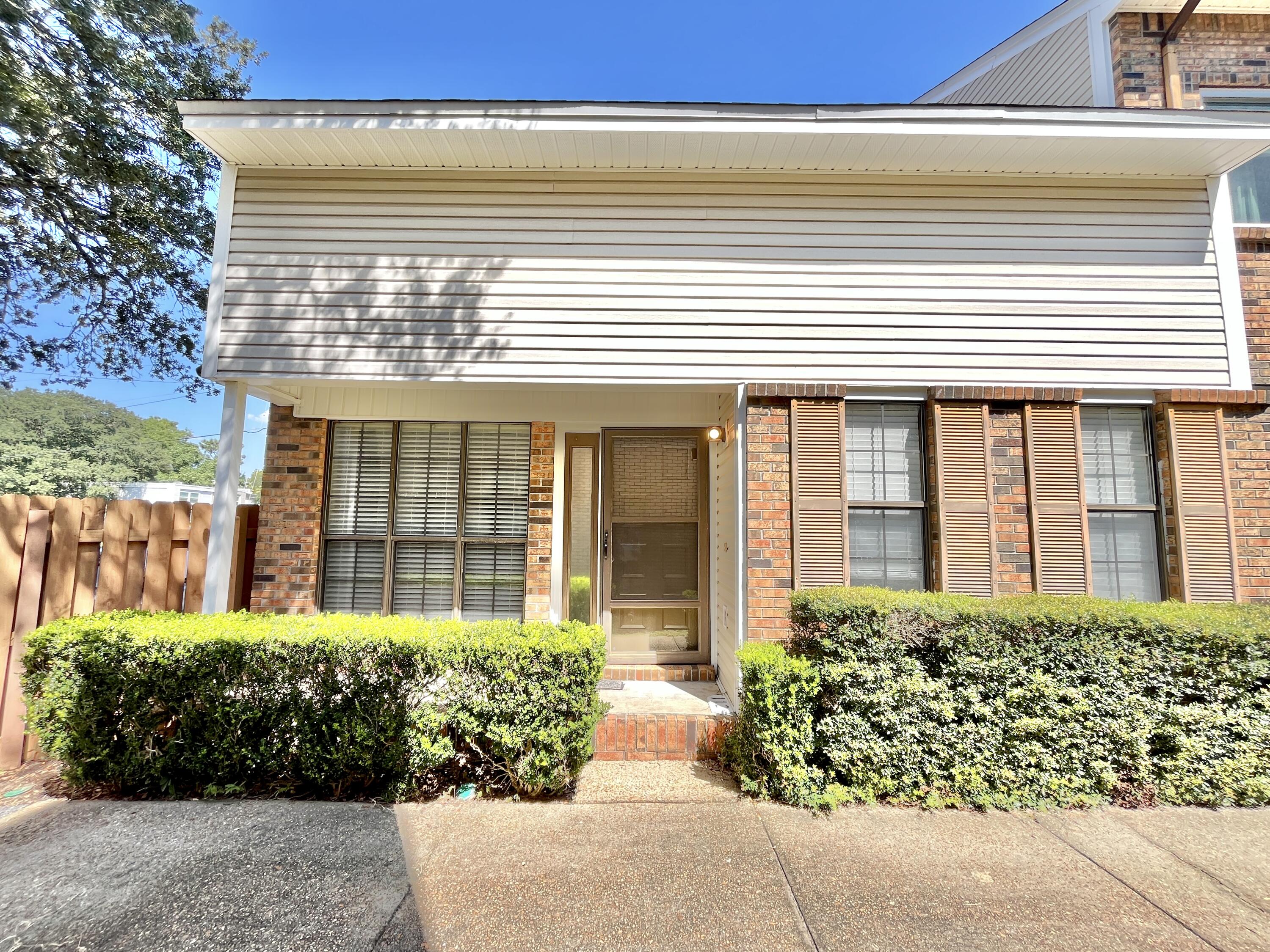 Large end unit 3 bedroom, 2 bath townhome with a one car garage, a bonus room that could be used as a 4th bedroom or home office and a large walk-in attic storage room. Tile floors downstairs, inside laundry, master bedroom downstairs, and 2 bedrooms, bonus room and storage room are upstairs. New carpet. No pets. Lawn care is provided. Large, enclosed courtyard with sidewalks, shade trees, community pool and pavilion for your use.