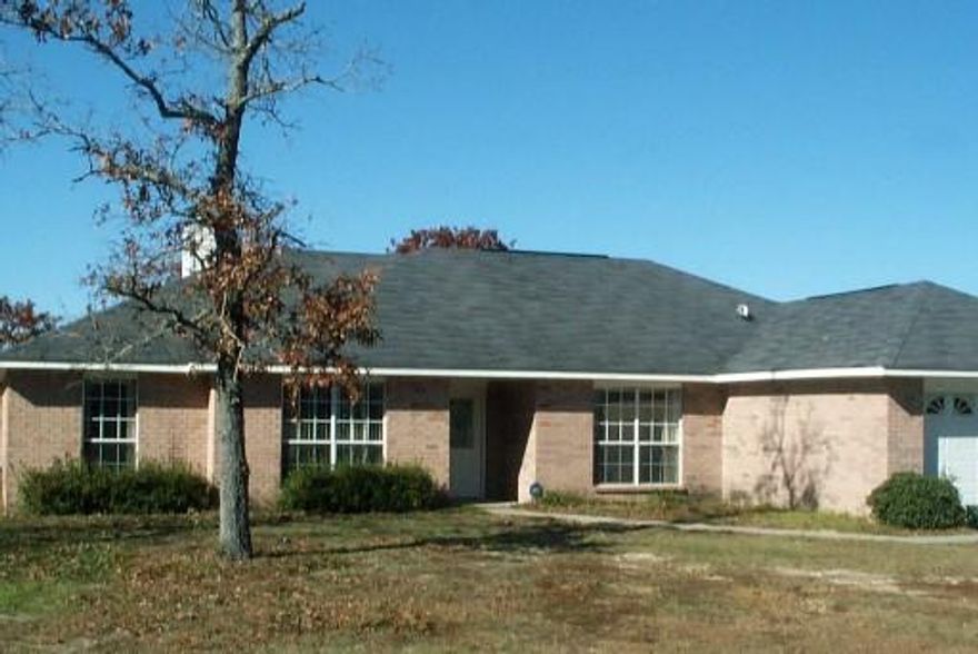 Beautiful home with plant shelves in the living room and cathedral ceilings. Kitchen has working center island w/ separate breakfast area. Library/den and formal dining room.