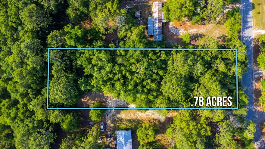 Wooded lot just minutes from downtown Milton with nearby access to Interstate 10. Power and public water is available and it's located on a county maintained paved road. Mobile homes are allowed! High and dry with flood zone X according to the Santa Rosa County GIS map.