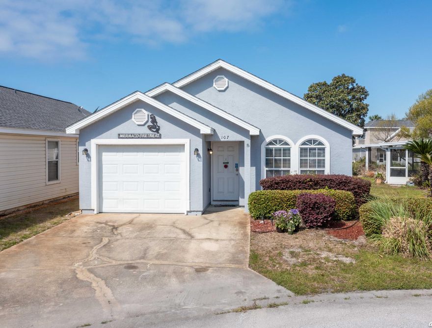 SHORT TERM RENTALS ARE ALLOWED! Beautiful 2 bedroom, 2 bathroom home with a screened-in back patio, 1-car garage, and solar panels in the desirable gated Palm Cove subdivision, just blocks to the white sandy beaches! This home is located on a peaceful cul-de-sac with no thru traffic and no neighbors directly behind you. Solar panels offer instant savings to the buyer. Most furnishings will convey including the washer & dryer plus the backyard grill. This home greets with a welcoming foyer and opens up to the kitchen, dining area, and living room featuring an open floor plan. The kitchen is equipped with white appliances, plenty of counter space and cabinets, a breakfast bar, and a pantry.