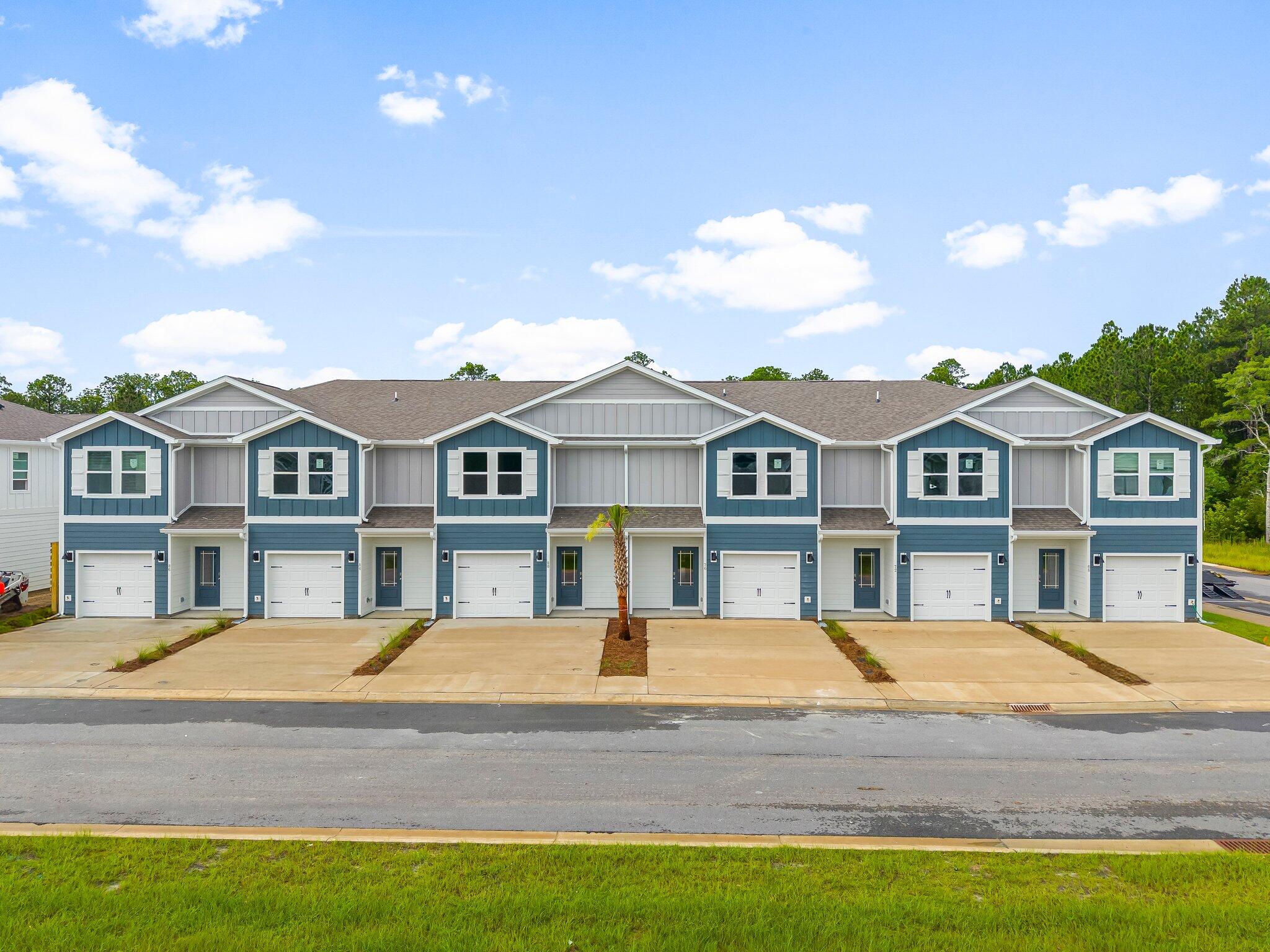 Welcome to 59 Mamba Ln, a new townhome located at Hawk's Landing in Santa Rosa Beach, Florida. This two-story townhome is under construction and with 3 bedrooms, 2.5 bathrooms and is an interior unit. As you enter this home you will find EVP flooring in the foyer leading to the expansive open-concept kitchen, living, and dining area, designed for entertaining and everyday living. The kitchen is open and spacious with a center island and features quartz countertops and premium stainless-steel appliances including a smooth top stove, microwave and dishwasher. The first floor is heart of this home, while the privacy of the second level holds all bedrooms, ensuring a quiet retreat. The primary bedroom has a generous size closet and a private bathroom with dual sink vanity, and ample linen storage, and a large shower. Additional bedrooms share a hall bath, creating a comfortable space.
A Smart Home Technology Package comes standard, featuring a Qolsys IQ touch panel for thermostat and lighting control, ensuring security and convenience with keyless entry KwikSet deadbolt. Exterior features of Hawks Landing townhomes are equally impressive, with Hardie?? siding, composite shingle roofing with a 30-year warranty, and thoughtful lighting at the garage, front entry, and back patio. A landscaped front entry adds curb appeal and welcomes you to your very own slice of Florida paradise.