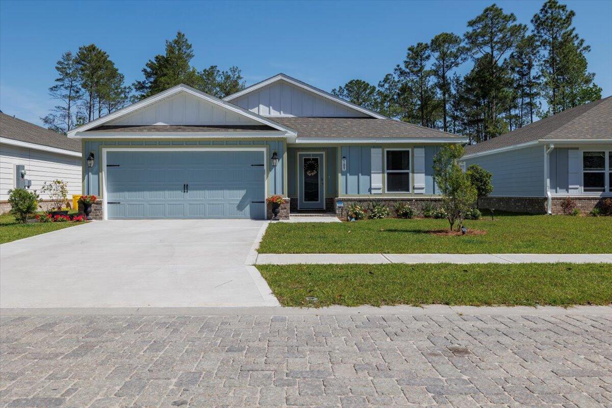 No need to wait for new construction, this one is ready to go and is full of upgrades! Ceiling fans, tile back splash in kitchen, new stainless steel side by side refrigerator, new washer and dryer. 3 bedroom 2 bath beautifully landscaped yard with solar powered lighting. Community amenities scheduled to be completed!