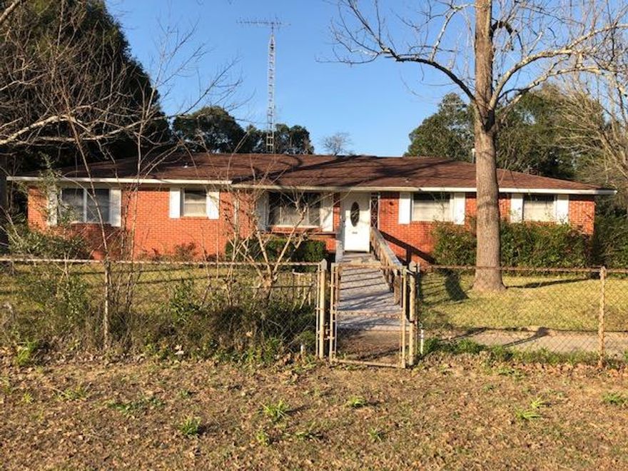 This Red Brick 3 Bedroom 2 Bath home is located in the center of Crestview, which allows you to have easy access to all local bases, shopping centers, and a quick drive to the Crystal white beaches.This home has a beautiful landscaped yard as well as totally chain link fencing and irrigation system. There is a small shed in the back yard for storage.This home has the original hardwood flooring which is beautiful. Kitchen has had some up dating .In this home you will find a large living room, a large Den and a great dining room. Don't let the age fool you this home has been well maintained.Schedule your showing today!!!