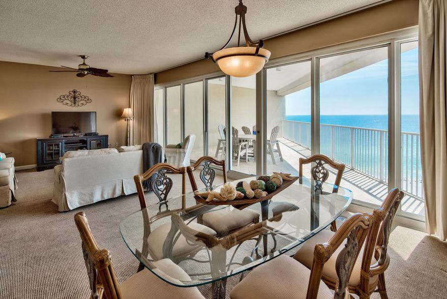 Enjoy incredible views from this 13th floor Tides at Tops'l condo unit that also includes a coveted deeded parking space. This 1,230 square foot unit showcases great views of the Gulf of Mexico from its large balcony with access from the open living area. The floor-to-ceiling sliding glass doors in the living room and dining area frame the picturesque Gulf views. The stylish kitchen features shaker style cabinets, granite counters as well as updated stainless steel and black appliances. The spacious master bedroom features a private bath with relaxing garden tub and separate walk-in shower. The guest bedroom along with additional bathroom makes this an excellent rental investment opportunity.