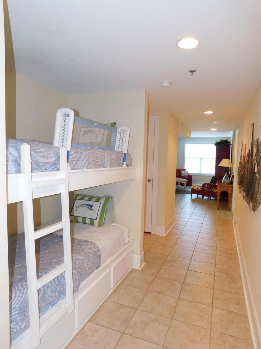 CANAL front condo in Mexico Beach! This spacious, furnished unit offers an open floor plan, oversized rooms, great views of the canal & pool, hallway bunks and a COVERED BOAT SLIP! This is an END UNIT! There is also a garage with a storage unit attached which leads you straight from the garage to the boat slip! This is perfect for anyone that has a fisherman in the family or just loves the water! The beach is only a quick stroll across the street and you are walking distance to the little shops and restaurants that Mexico Beach has to offer! **If measurements are important, please verify**