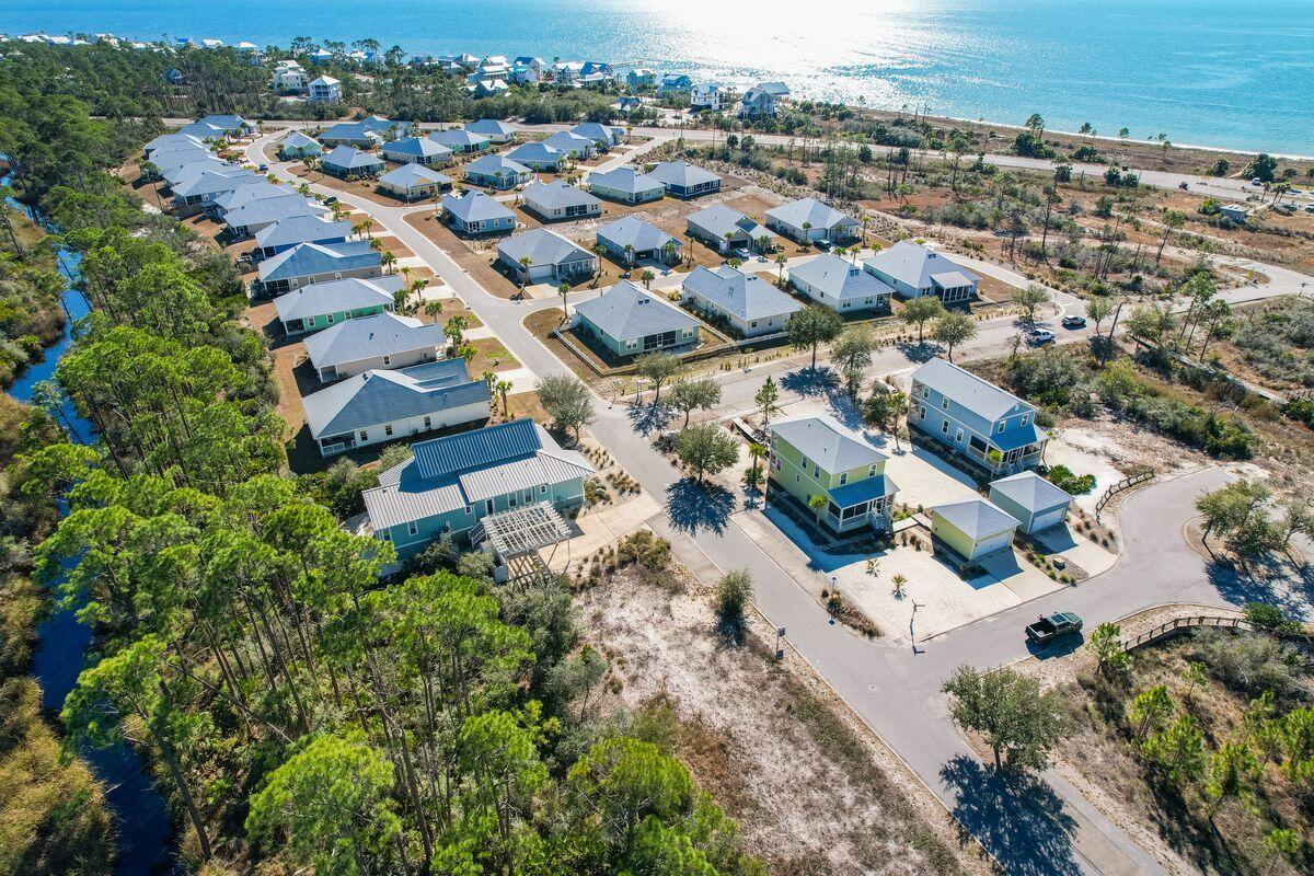 Welcome to Windmark Beach, where you can build your dream beach home on a .223-acre lot in a golf cart-friendly neighborhood near Windmark Village Center. Windmark Village Center offers a community pool, restaurants, rental store and is in close proximity to beach access. Approved home plans are available from the seller. All dimensions taken from property appraiser's site. Verify if important. Please view Covenants& Restrictions and Plat map;