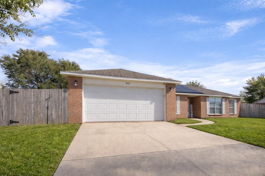 2.25% VA Assumable! View this fully updated all-brick home in South Crestview! This spacious 4-bed, 2-bath gem features nearly 2,400 sq ft, a charming sunroom with barn doors, a formal dining room, and a flat, fully fenced backyard. Enjoy peace of mind with a dimensional roof (2016), new HVAC (2023), new full gutters (2025), and new front and rear doors with a hurricane-rated sliding glass door (2025). Inside, you'll love the updated flooring and open, split floor plan. The large living room offers a cozy fireplace, while the kitchen shines with granite countertops, modern lighting, stainless steel appliances, and a spacious eat-in area.
