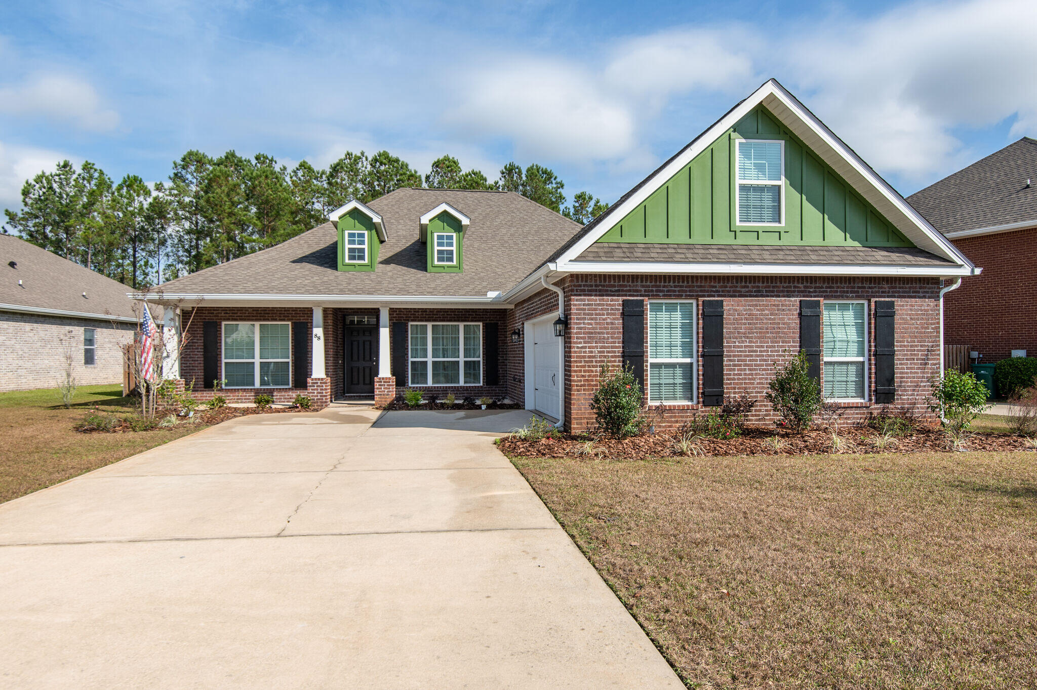 FOUR-SIDED BRICK 5/2.5 HOME ON FULLY FENCED THIRD ACRE LOT ON NATURE PRESERVE IN HAMMOCK BAY! This home has just been updated with gorgeous wide plank LVP, a thick coat of fresh paint, stunning quartz countertops in the kitchen, new kitchen appliances including oven w/ air fryer, light fixtures, ceiling fans, fireplace surround, etc. With five bedrooms, (upstairs is comprised of only one bedroom w/ new carpet), separate dining and a wood burning fireplace, this home offers plenty of options! Excellent curb appeal with a side load garage and convenient courtyard parking. Your large flat lot will accommodate almost any outdoor activity, summer kitchen or garden. Monthly HOA fee of $168.10 covers basic cable and extensive Hammock Bay amenities including: 24/7 8,000 SF fitness facility