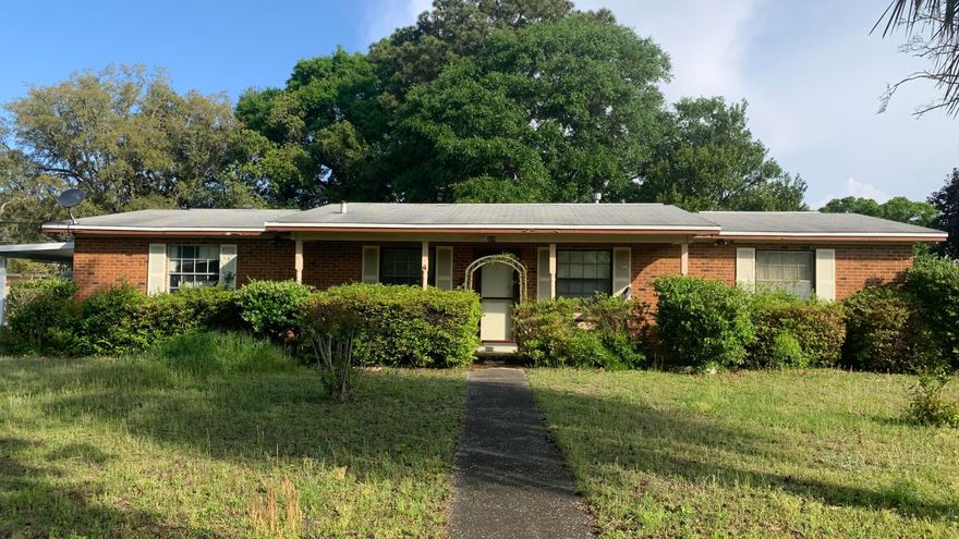 Under contract but accepting backups! PRICE REDUCED, MAKE AN OFFER! 3 Bedroom, 1.5 bath home on a fenced in corner lot in Fort Walton Beach. A family room to include a fireplace. Large laundry room with plenty of storage space. Parquet flooring, in great condition. Plenty of space for renovations and storage. Room for a pool. With a few updates, this could be your dream home! NO HOA! This property will need a new roof, possible electrical. Seller will not be making any repairs. Cash Offers only with a quick close!