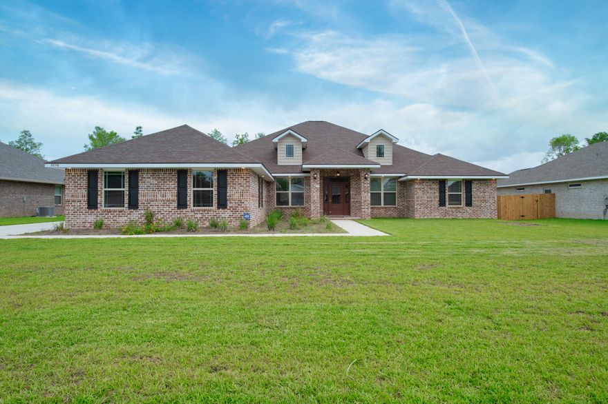 This practically brand new home, built in 2019, is now available to call your own! This spacious 5 bedroom, 3 bathroom home has all the bells and whistles. With an open concept, there is beautiful wood look tile throughout and carpet in the bedrooms. The great room has a double tray lit ceiling while the kitchen boasts tons of countertop space! The kitchen features stainless steel appliances, quartz countertops, and plenty of seating at the pop-up bar. Take advantage of the extra living space off the great room...make it a play room, exercise room, or extra living room! Enjoy the two separate dining spaces. The formal dining room has a tray ceiling and very open feel. The master bedroom has plenty of space for larger furniture. The master bathroom is luxurious with a double vanity, with