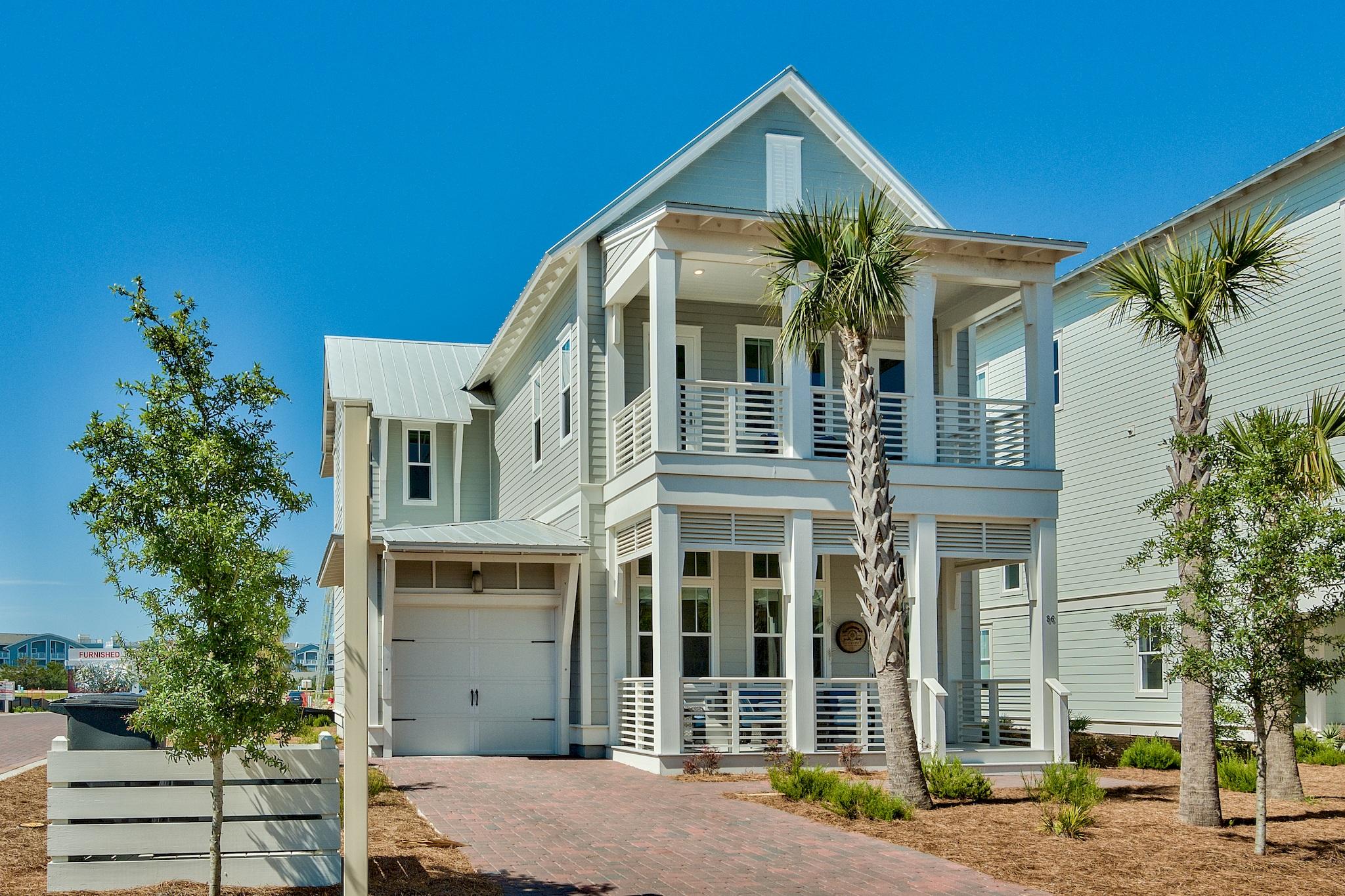 The highly desirable ''Laguna plan'' located south of 30A in Prominence. This stunning beach home was professional designed and is being offered fully furnished. This one of kind property is located on a corner lot and is uniquely designed to feature 4 bedrooms, 4.5 bathrooms, and a oversized 1 car garage. This breathtaking floor plan offers an open concept with incredible craftsmanship from the moment you enter the home. Finishes include shiplap and crowd moulding throughout, 8ft doors, 10ft/12ft ceilings, hurricane impact windows, and a tankless water heater. There are two spacious master suites located on the 1st and 2nd floor. Each master suite features its own private bath and porch. The master bathrooms feature a frameless walk-in shower/tub, quartz counter-tops, and dual vanity sink
