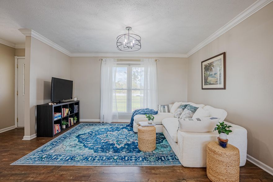 Welcome to 3015 Stanford Rd in Panama City -- a beautifully maintained and thoughtfully updated brick home that combines timeless construction with modern upgrades, all in a convenient and highly desirable central location.Inside, you'll find a bright and welcoming open living and dining area designed for comfortable everyday living and easy entertaining. Large windows allow natural light to flood the space, creating a warm and airy atmosphere throughout the home. Durable flooring runs throughout the house with no carpet, providing a clean, modern look and low-maintenance lifestyle.The spacious primary bedroom offers a relaxing retreat and features a generous walk-in closet along with a convenient private half bath. One additional bedroom provides comfortable space for family, guests, or a home office, making the layout both practical and flexible.

This home has been extensively improved with a long list of thoughtful upgrades. Major system updates include a new HVAC system and hot water heater installed in 2022, followed by a new well pump in 2023. In 2024, the kitchen was updated with new appliances, and in 2025 the home received a comprehensive renovation that included a completely new kitchen, updated bathrooms, a redesigned laundry area, new gutters, fresh interior and exterior paint, updated plumbing, electrical improvements, and all new lighting fixtures throughout the home. A new sliding glass door was also installed, providing easy access to the backyard, and a new washer and dryer were added.

The improvements continued in 2026 with a beautifully renovated main bathroom featuring a tub and shower combination with classic subway tile. Outside, the concrete patio has been freshly stained to create an inviting outdoor living space. The shed has been painted to match the home, and new landscaping and plantings enhance the home's curb appeal.

Additional features include a convenient one-car garage and a spacious yard perfect for relaxing, gardening, or entertaining.

Ideally located, this home is just minutes from the new Publix shopping center at SweetBay and close to the shopping, dining, and everyday conveniences along 23rd Street. The beautiful beaches of the Gulf of Mexico are also only about 20 minutes away.

With extensive upgrades, abundant natural light, and a prime location close to everything Panama City has to offer, 3015 Stanford Rd is truly move-in ready and a wonderful place to call home.