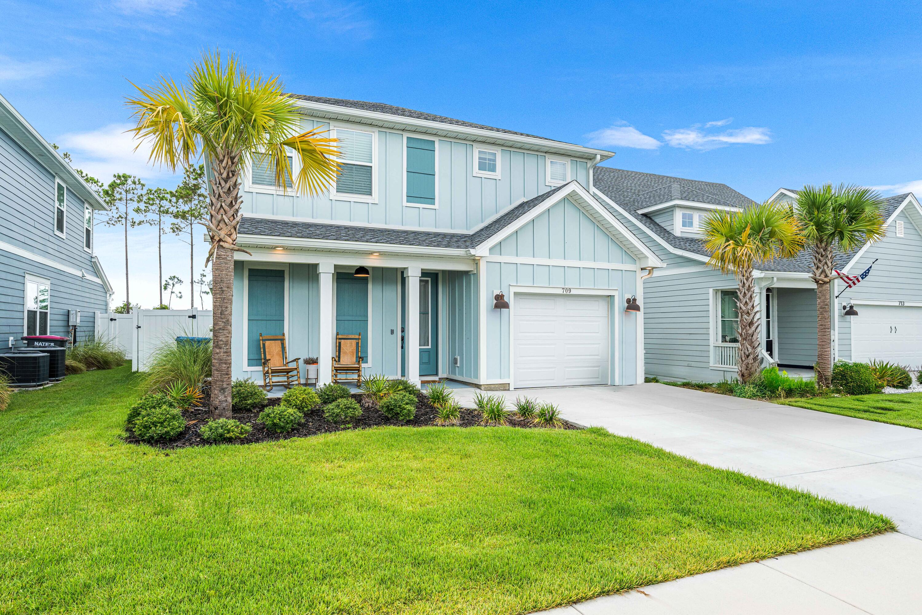 Welcome to this stunning 4-bedroom, 2.5-bathroom home located in the sought-after community of Breakfast Point East. Built by TruLand Homes, this popular Carrabelle Plan offers the perfect combination of style, comfort, and functionality.Step inside to find luxury EVP flooring throughout the main living areas, tile flooring in the bathrooms and laundry room, and plantation shutters that add a touch of timeless elegance. The home features 9-foot ceilings and 8-foot doors, creating a spacious and open feel. The open concept kitchen is a chef's dream, complete with a farmhouse sink, large pantry, and modern finishes that elevate every detail. Plenty of light and room for easy living.The home's outdoor living space is just as impressive, featuring an extended patio, pergola, and a firepit-perfect for entertaining or relaxing in your private oasis.
Breakfast Point East is nestled alongside thousands of acres of pristine conservation land and offers a true Florida lifestyle with nearby beach access, and close proximity to dining, shopping, medical facilities and Breakfast Point Academy. Enjoy walking and biking trails with easy access to Gayle's Trails, a network of nearly 30 miles of scenic trails within the Panama City Beach Conservation Park.
Don't miss the opportunity to own this move-in-ready home in one of Panama City Beach's most desirable neighborhoods!