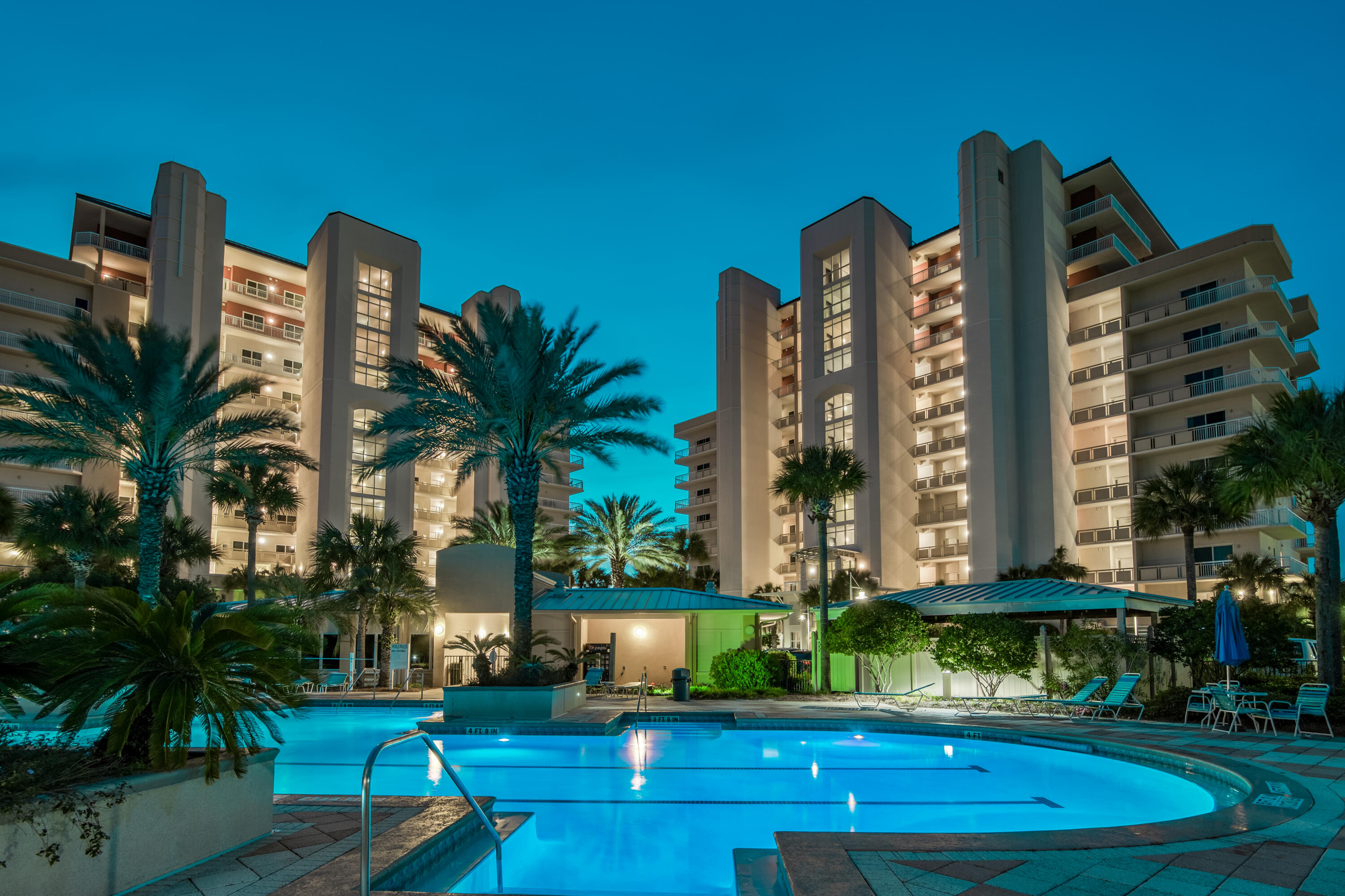 Best location in Destin, Harbor Landing sits on the Destin Harbor where you have an option to rent or own a deep water boat slip on the property.  The harbor grants access to the intercoastal waterway and the emerald waters of the gulf of Mexico for great boating and fishing.  An oversized covered patio covers the length of the condo and provides spectacular unobstructed views of the harbor that includes Thursday night fireworks, world class local restaurants, fishing competitions, boat parades and wildlife like dolphins, manatee, heron and osprey.  An open living space with expansive windows and sliding patio doors invite the glorious colors and activity of the harbor indoors while you entertain, relax, cook or eat together. Neutral oversized tile in the living areas, light colored LVP in the bedrooms and a fresh coat of paint throughout the unit further enhance the vibrant colors of the harbor.  Stainless steel appliances, granite countertops and wood cabinetry combine to create the most convenient kitchen for cooking and preparing your meals.  A bathroom accompanies each bedroom plus there is a half bath for guests.  An outdoor storage closet, large laundry room and a designated covered parking space add to the already comfortable lifestyle this unit offers.  Harbor Landing amenities include two pools, a workout center, deeded beach access and a private marina.  