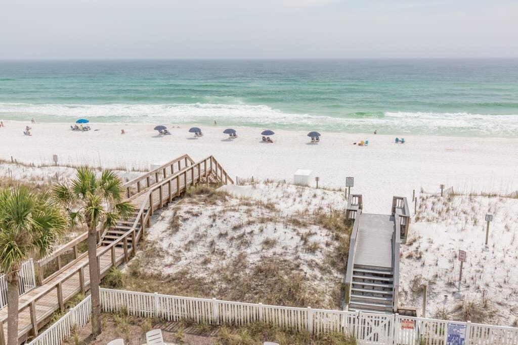 Welcome to your dream beach getaway! Incredible opportunity to own a 1 bedroom, 1 bath condo with hallway bunks in a small condo complex of 9 units located on the Gulf of Mexico offering the perfect blend of coastal luxury and convenience. Step into your private oasis and be greeted by a stylishly decorated living space that exudes relaxation and tranquility. Indulge in the breathtaking views and refreshing sea breeze from your own private balcony, where you can sip your morning coffee or take in the beautiful colors emitted in the sky from the sunset. As part of this coveted community, you'll have exclusive access to a sparkling community pool, perfect for a refreshing dip on warm summer days. The pool area provides a relaxing ambiance, complete with loungers and tropical landscaping, creating a serene oasis for ultimate relaxation. Furthermore, this condo comes with deeded beach access, meaning the Gulf of Mexico is your private backyard piece of paradise where you can enjoy direct and convenient entry to the pristine shoreline. Spend your days building sandcastles, collecting seashells, strolling the beach, watching dolphins frolicking in the surf or soaking up the sun. Whether you're seeking a permanent residence, a vacation retreat, or an investment opportunity, this condo offers it all presenting an exceptional value and a true coastal living experience. Schedule a showing today and start living the beachside lifestyle you've always dreamed of!