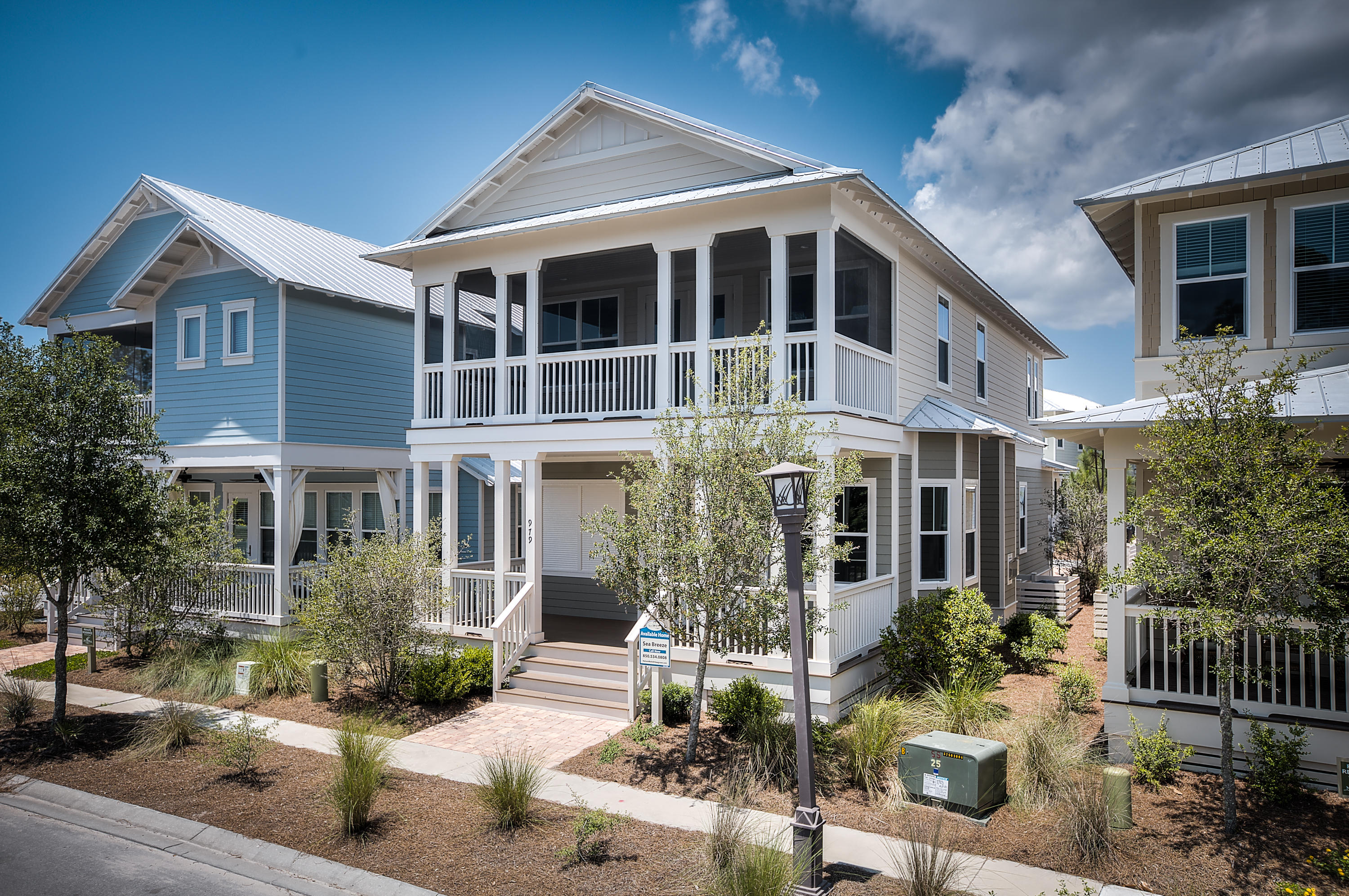 New, high-quality construction homes in NatureWalk, nestled between protected borders of the state forest, adjacent to WaterColor, Seaside, and the heart of 30A. Charming new home offers 2 stories, 1 car garage, 3 bed/3.5 baths, bunk room AND day room. Fireplace with mantle and tile surround. Enjoy the views of protected preserve and pond off of either of the front porches! The Sea Breeze has the most outdoor living space of our Village Collection. Features dark pine floors, upgraded cabinets, granite, tile backsplash, and GE Caf Appliances adorn this kitchen. The Gathering Place, the community's amenity center includes: a resort-style beach entry pool, heated lap pool, children's pool, tot lot, hammocks, multiple entertainment areas including a firepit, grills and seasonal BEACH SHUTTLE hammocks, multiple entertainment areas including a fire-pit and grills (and seasonal beach shuttle) all encompassed by the beauty of Point Washington State Park. Only a short bicycle ride away, you'll find yourself enjoying downtown WaterColor, Seaside, and the gorgeous Gulf Coast beaches!
