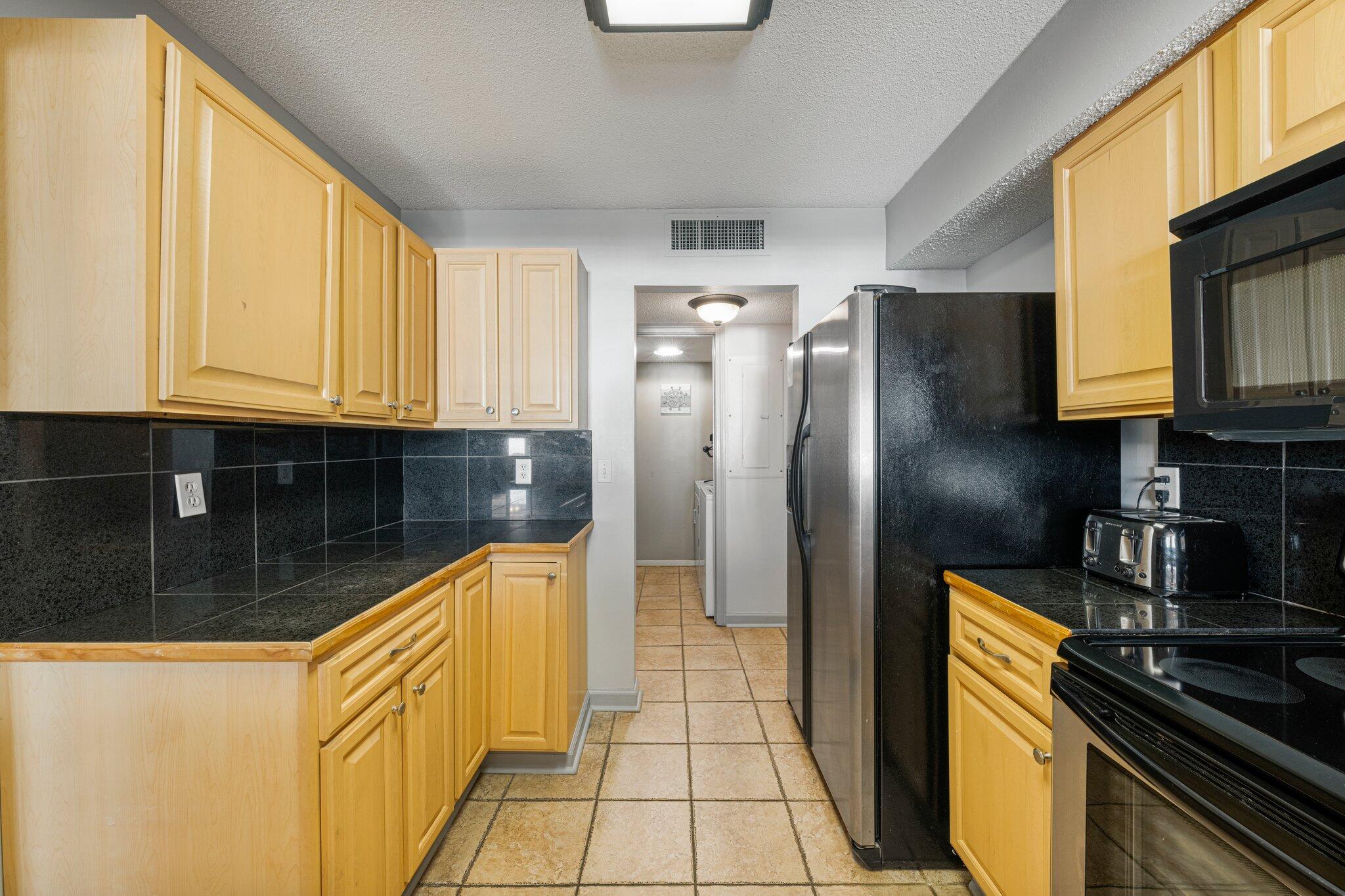DUNES OF PANAMA PHASE V UNIT E-206 ORB 1015 P 1886 3BR 2B 1480 H&C ORB 3798 P 58 GARAGE UNIT G-64 - Residential