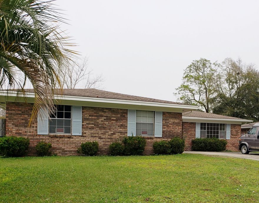 This charming home is located close to shopping and dining, and the local schools. It has a very beautiful yard with great additions like an enclosed patio area, brick flowerbeds , flower bushes and a wooden fence. The house  has so much potential and would be such a cute flip house! The overall exterior appearance is still very beautiful , the inside could use a good cleaning and still be habitable, or you could redo the floors and cabinets and give it an updated modern look to please many buyers! Professional pictures coming soon