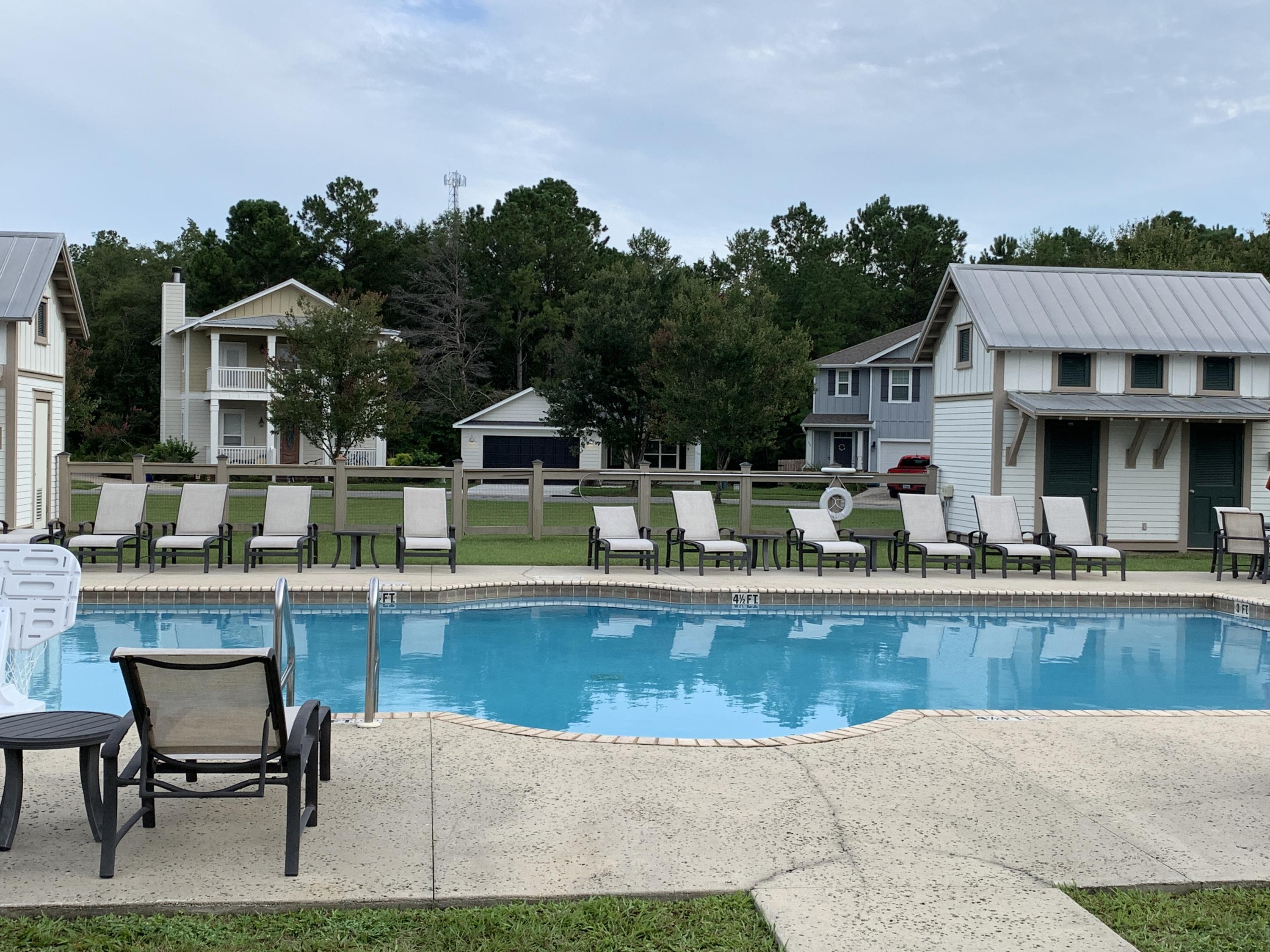 OWNER FINANCING with $10,000 down at 7% interest with 30 year amortization & 5 year balloon. Payment of $198.93/mo . No neighbors behind your at all. Over 200' of conservation land behind you with a river running behind that. ALL TAP FEES HAVE BEEN PAID. This lot has a good slope, so you could build a walk-out basement on the back side of a home. One of the more secluded lots in the neighborhood. Great amenities in Lagrange Landing with a neighborhood pool and play ground.