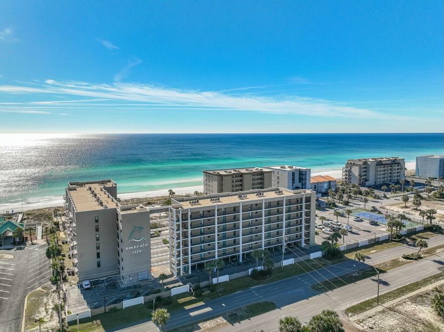 30K price reduction!! Welcome to this beautiful turnkey ready updated vacation rental with amazing gulf views! This condo features a spacious remodeled kitchen with granite and stainless appliances, gulf views from main living areas & master bedroom and a perfect balcony for watching the dolphins pass by!  Enjoy all that Emerald Isle has to offer including a gulf front pool, tennis courts and the sugar white sands on the beach! Emerald Isle completed a renovation in 2017 to include new hurricane rated doors, windows and sliders. Unit has reserved parking spot right next to building by elevator. Come see all this beautiful unit has to offer!