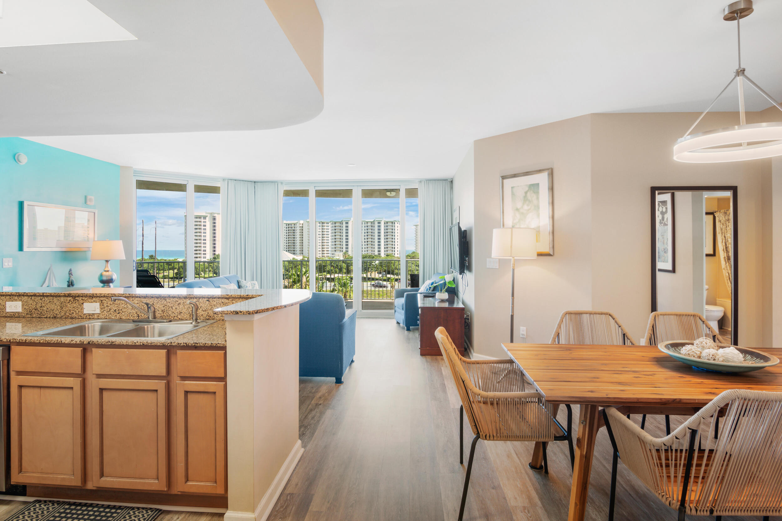 Stunning panoramic gulf view suite! This condo boasts some of the most spectacular views that the Emerald Coast has to offer at the Palms of Destin Resort & Conference Center. These 3 bedroom/2 bath suites rarely come available! Offering a large open floor plan with LVP flooring throughout, and incredible scenic views from every room; this gorgeous unit makes for a lovely second home, or rental property. The kitchen comes fully equipped with granite countertops, Whirlpool & LG appliances, along with an open bar to entertain guests; two large master suites with gulf views, a third bedroom, along with two full bathrooms. The large balcony offers the perfect space to unwind and enjoy some of Destin's finest views. Unit includes all furnishings. Buyer to verify any features deemed important.