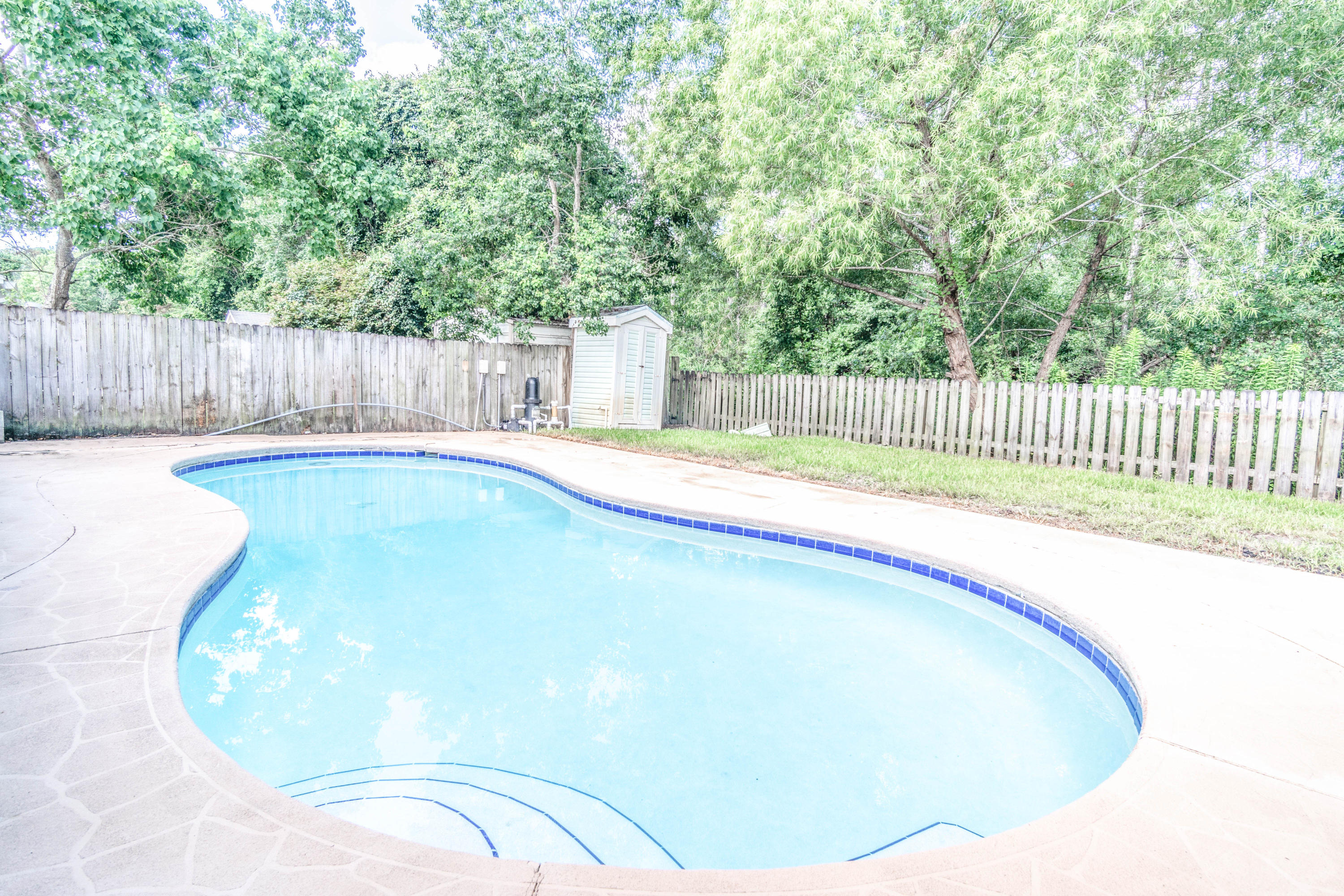 Accepting Back Up Offers. Inspection Contingency in place. Renovated 4/2 Home in Fort Walton Beach with an in-ground Pool! New AC being installed! Updated kitchen and bathrooms have solid wood cabinetry with soft close drawers, solid surface countertops and fixtures. Fresh paint, new fixtures, and Luxury Vinyl Plank flooring throughout the house ensures low maintenance and is pet friendly. Enjoy entertaining in the the spacious Fenced In Yard with a Private Pool! The fenced in yard is great for relaxing as it backs up to the woods. There is a large shed and pool shed. Other features include newer roof, tankless water heater, plantation shutters and crown molding throughout. This Home is Move in Ready! Don't wait, tour this property today!